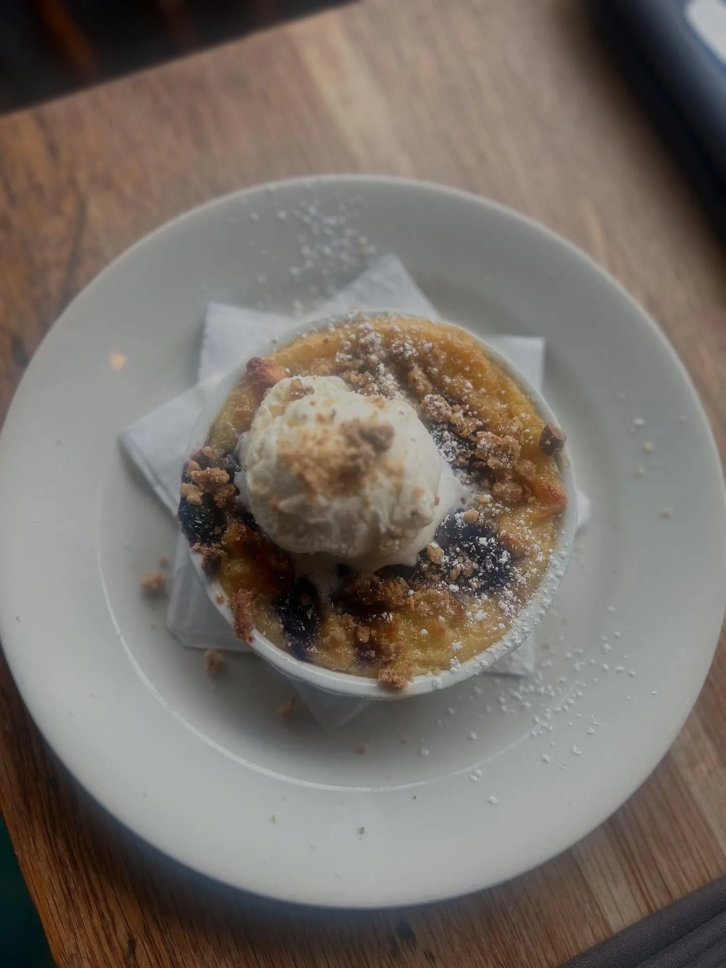 Story&rsquo;s Farm sweet corn &amp; blueberry bread pudding w/ currant swirl ice cream &amp; pistachio streusel topping
