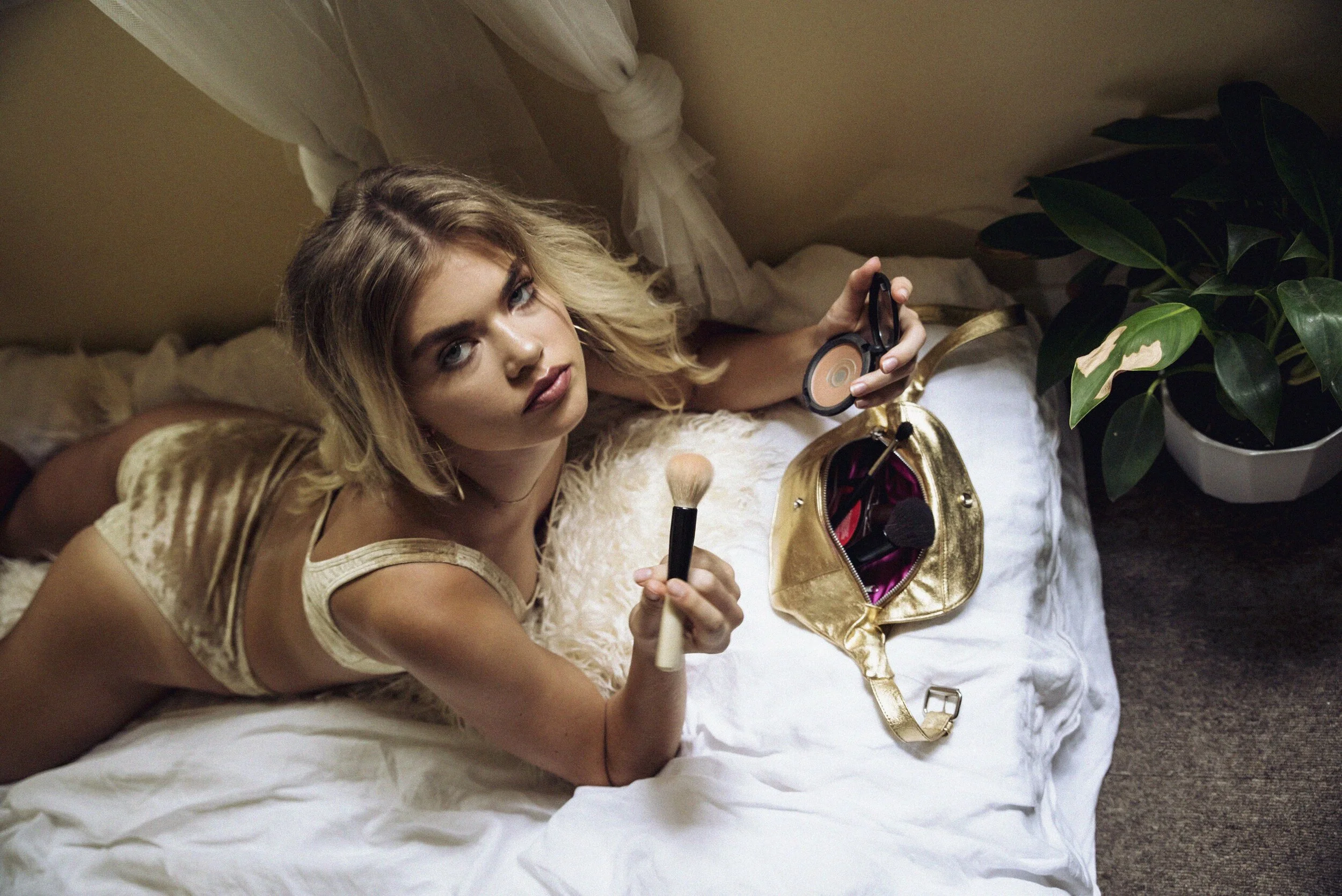 Velvet set doing makeup