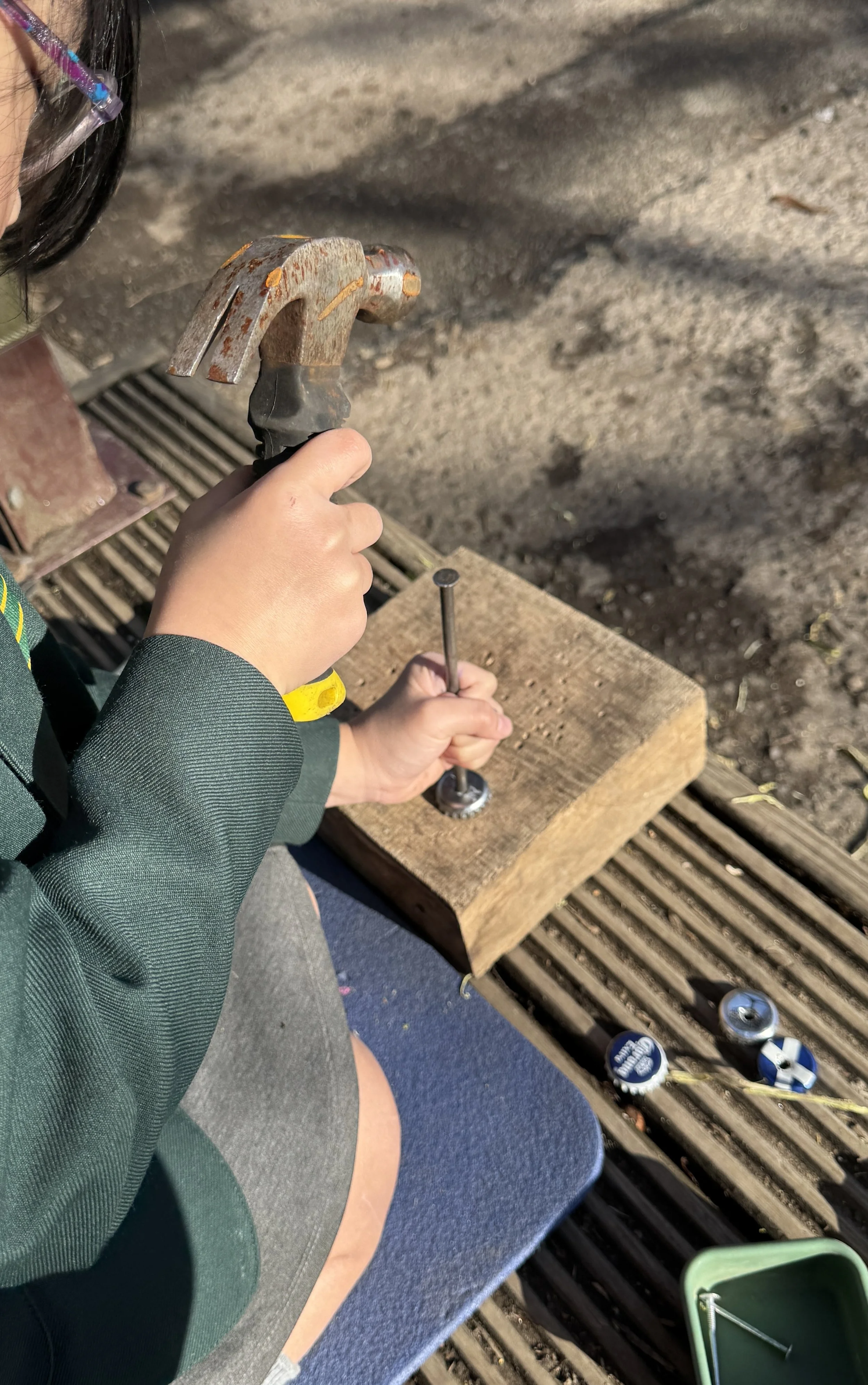 Making hole with hammer and nail.jpg