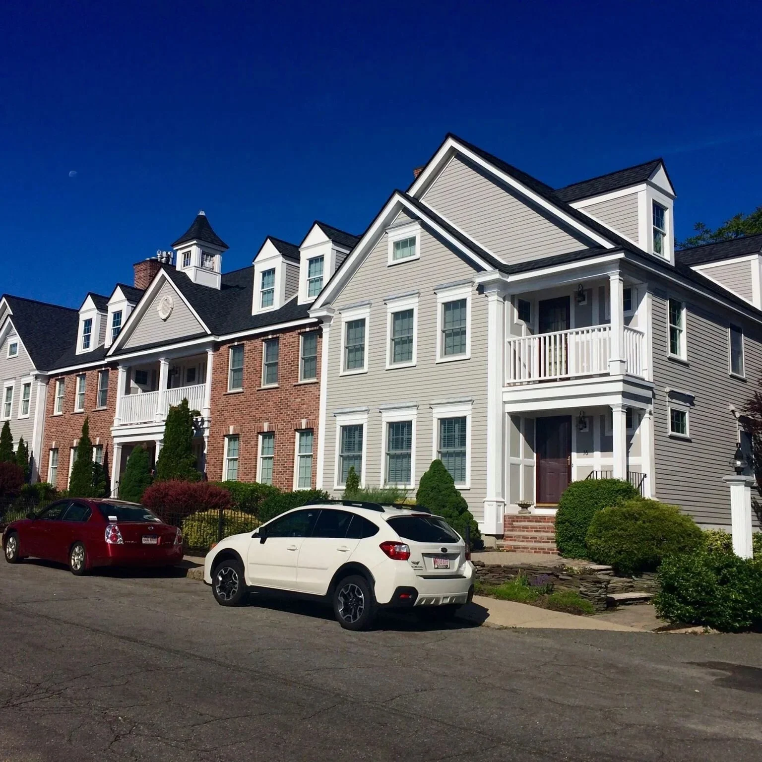 Exterior painting in progress multi-unit condominium North Shore MA