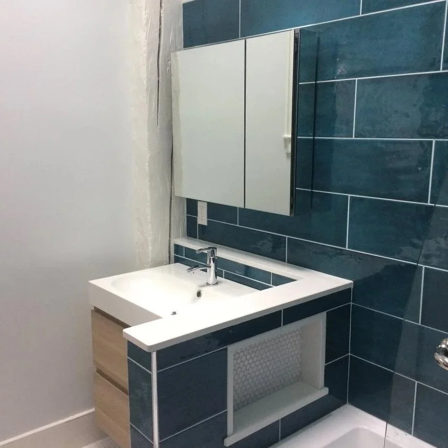 Bathroom remodel floating vanity mirror cabinet North Shore MA — Albion Contracting
