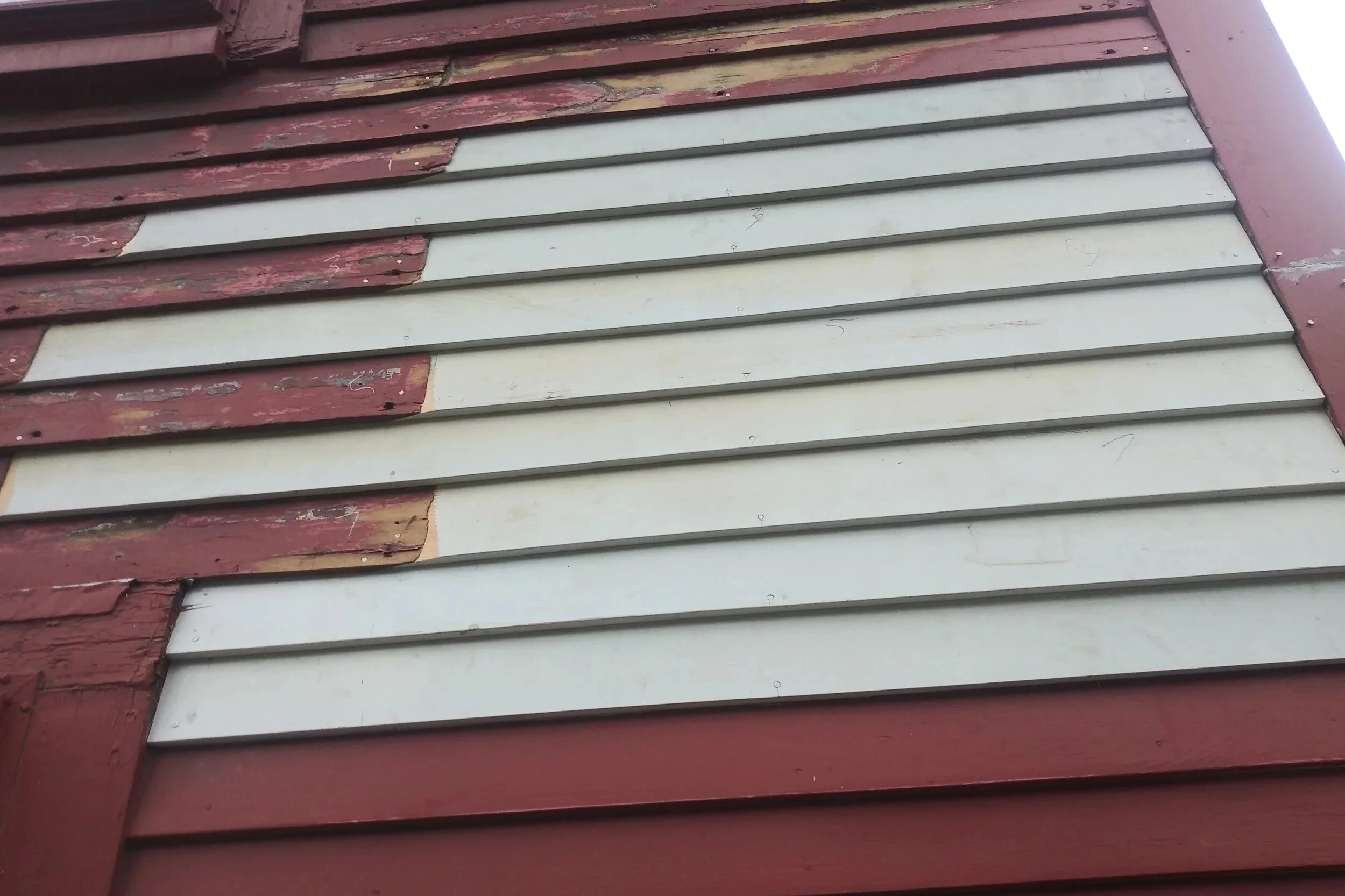 Historic clapboard siding restoration North Shore MA