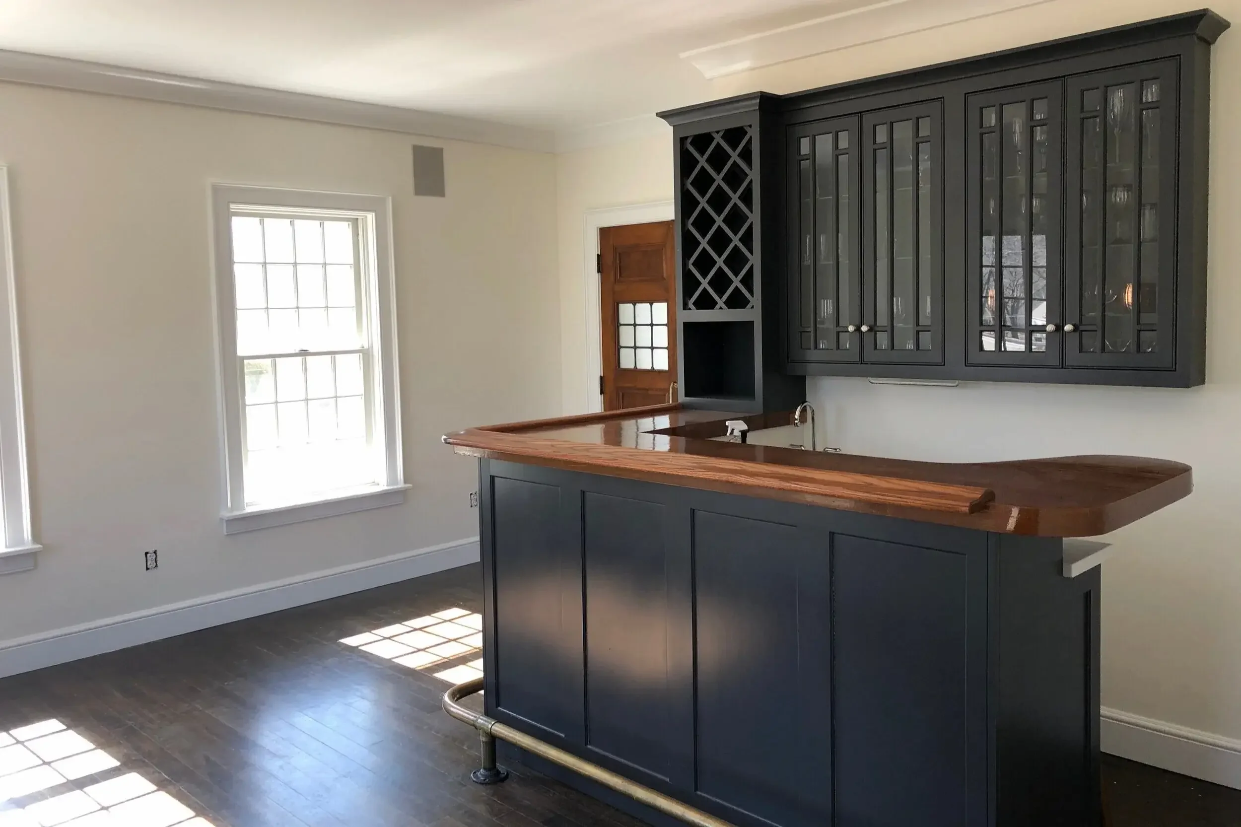 Custom bar with walnut top finish carpentry North Shore MA