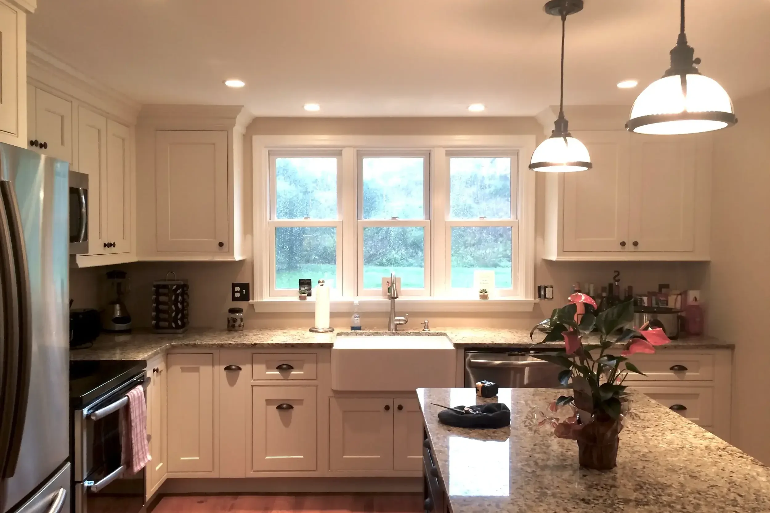 kitchen-remodel-farmhouse-sink-triple-window-pendant-lights-north-shore-ma.png.webp