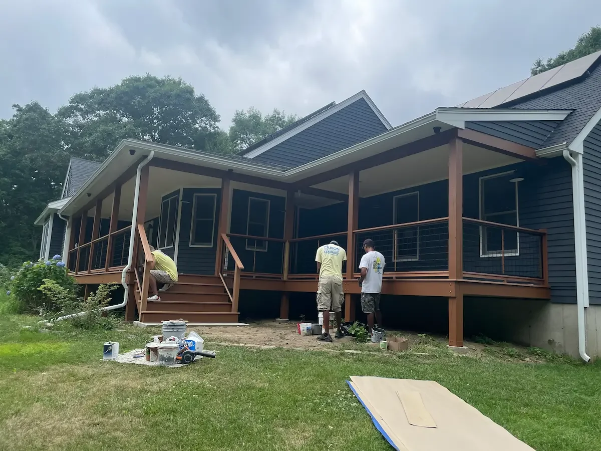 lbion Contracting crew painting and finishing new porch addition, Newburyport MA