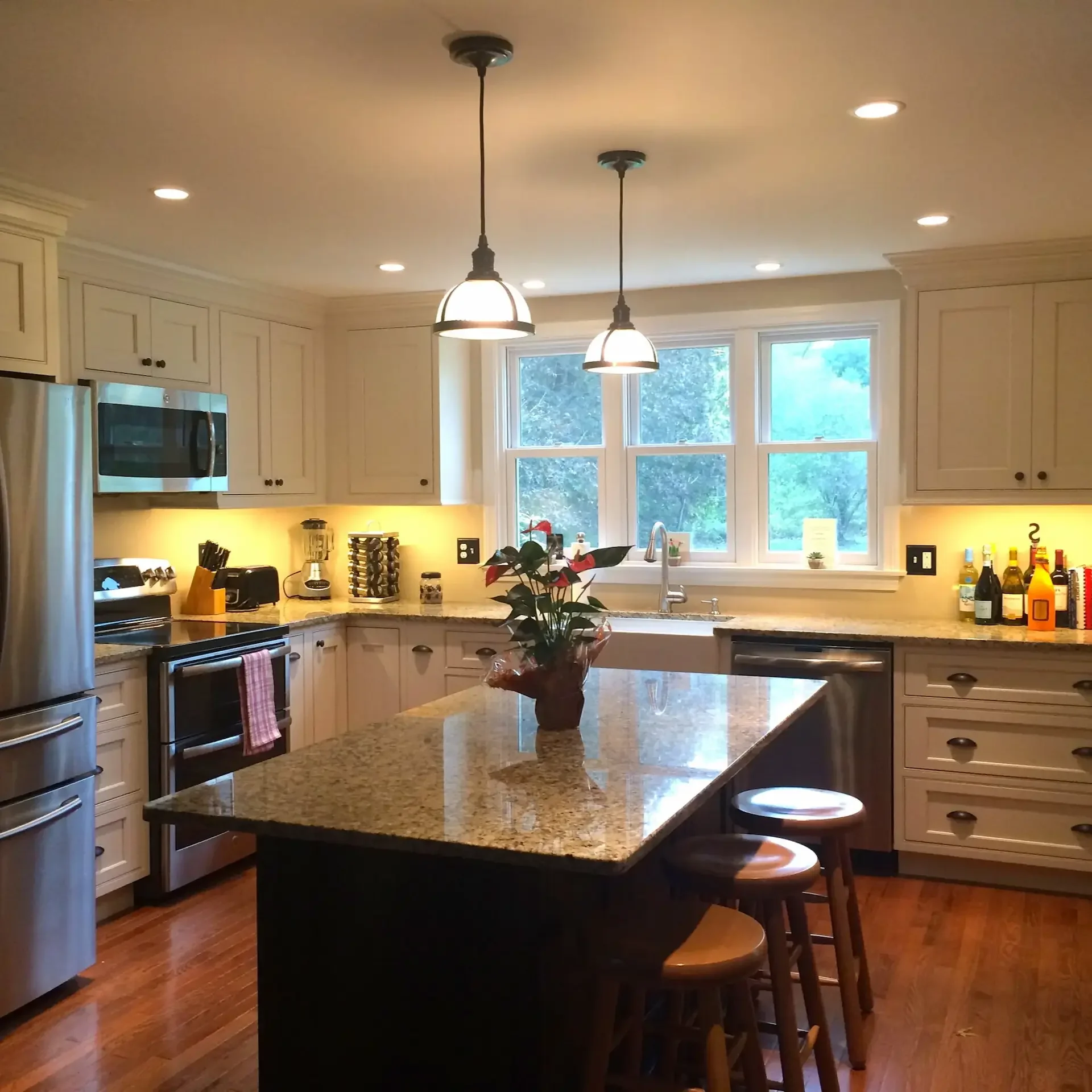Kitchen and family room remodel dark island pendant lighting North Shore MA