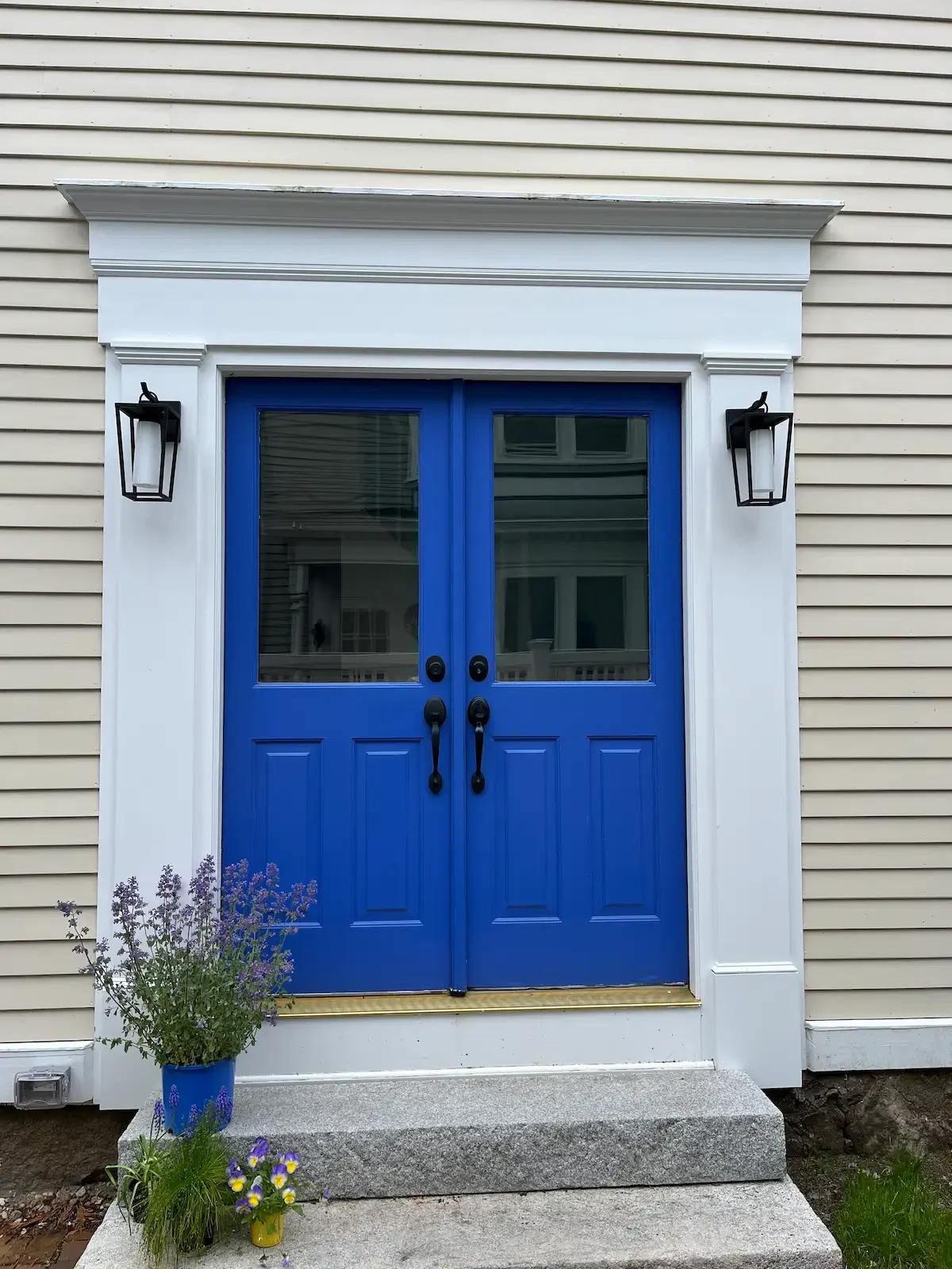 Custom entry door surround with pilasters and pediment, finish carpentry by Albion Contracting, Newburyport MA