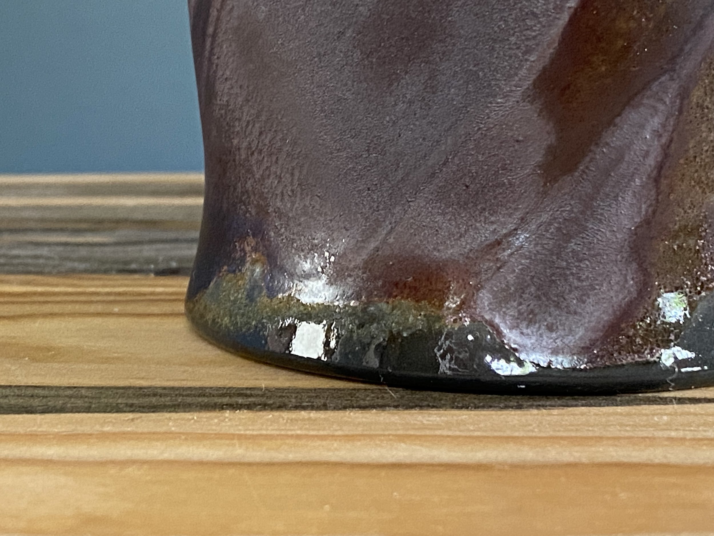 Cup with local clay slip brushed onto exterior