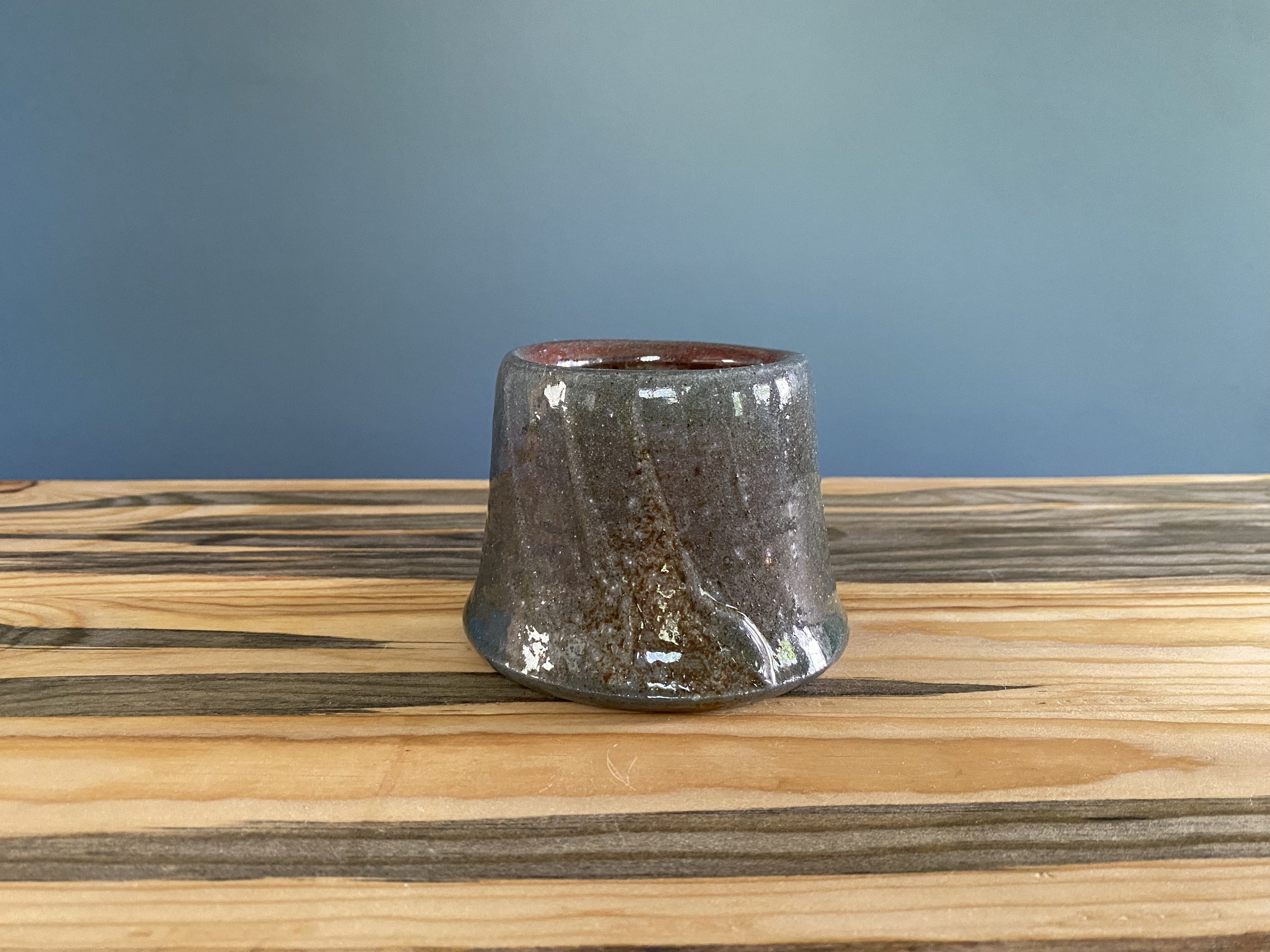 Cup with local clay slip brushed onto exterior