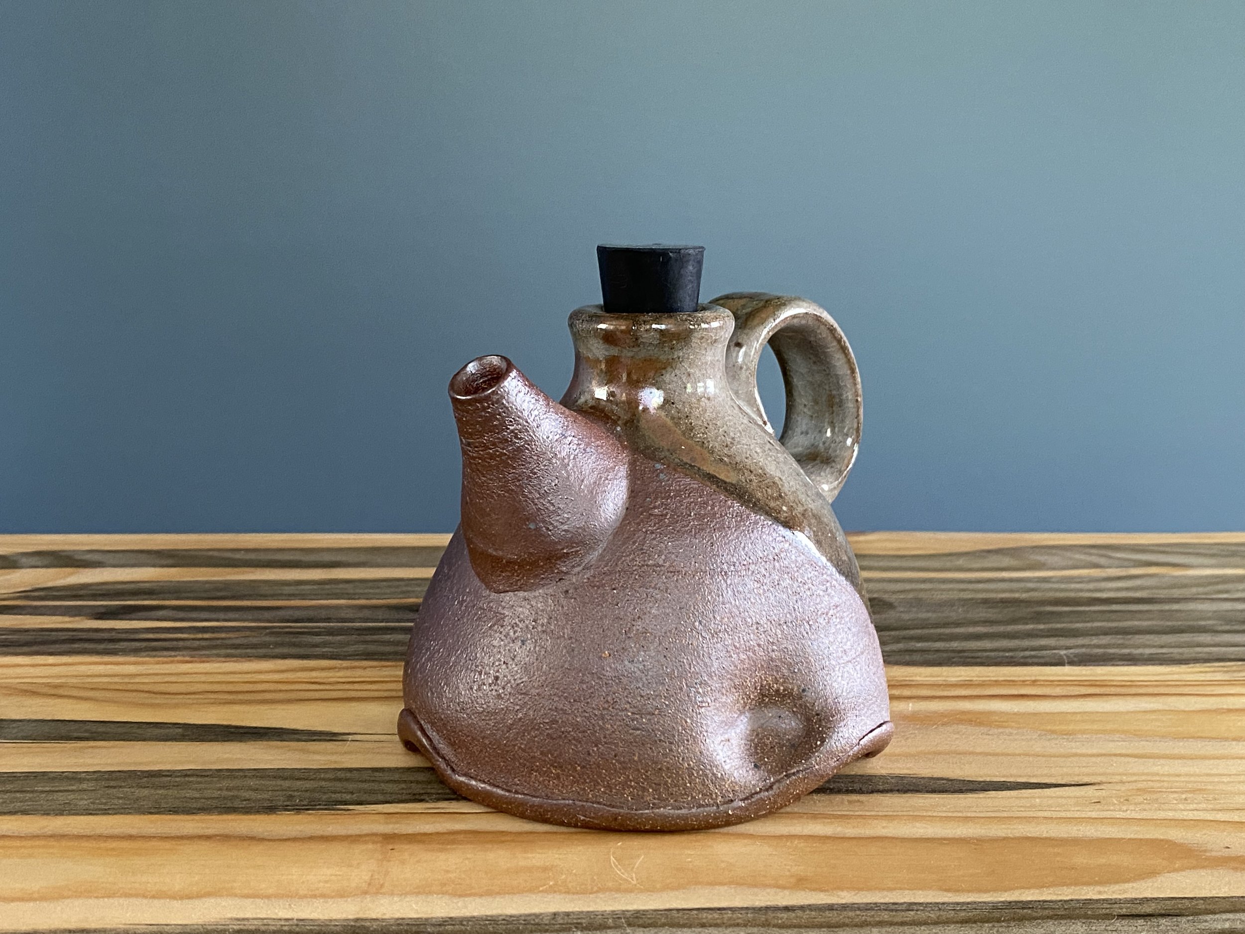 Cruet in dark stoneware and shino glaze
