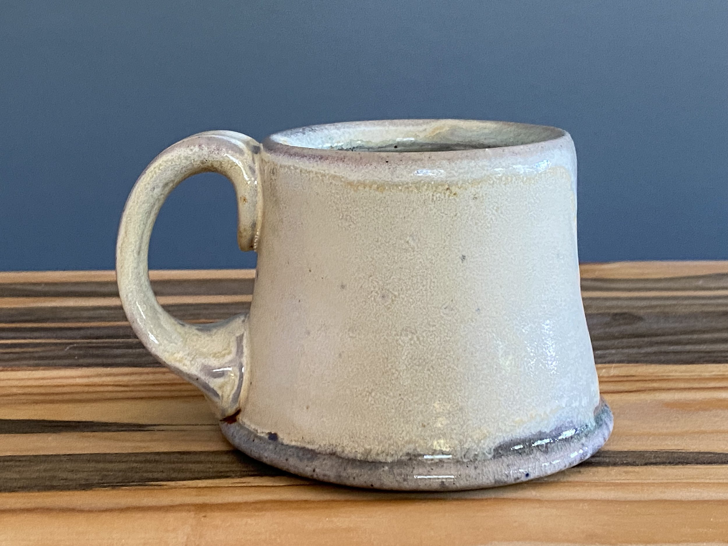 Stoneware mug with yellow salt glaze