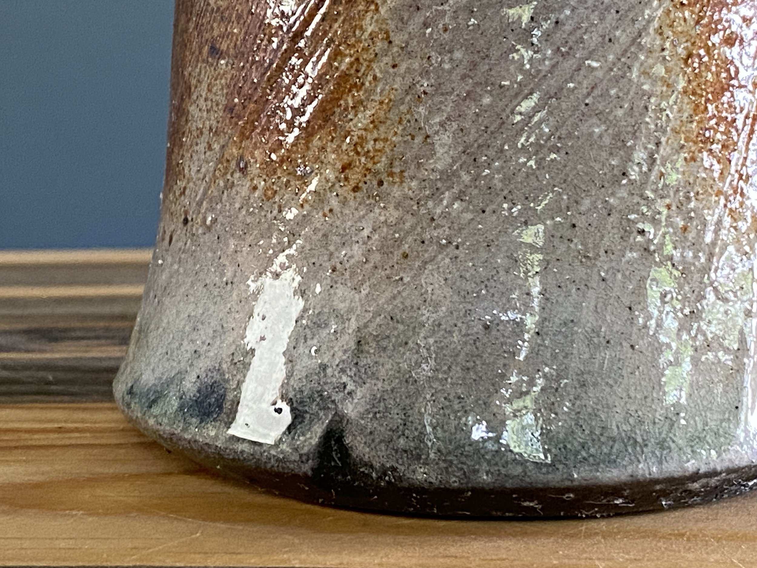 Cup with local clay slip brushed onto exterior