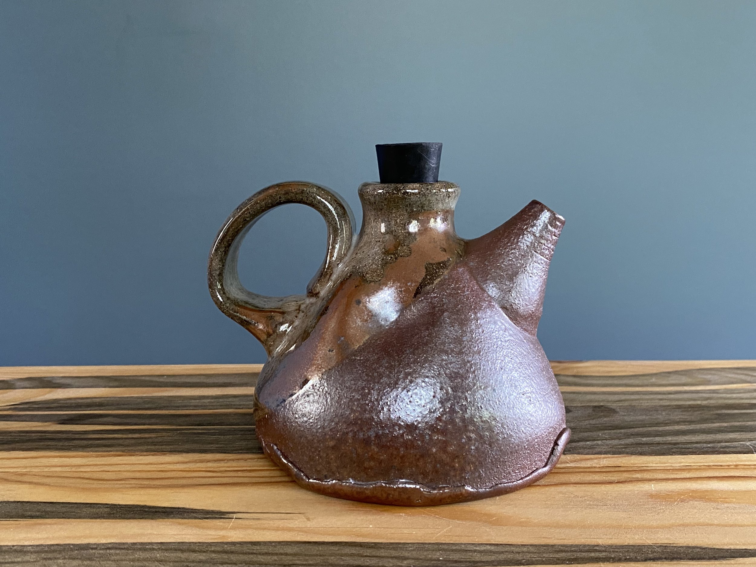 Cruet in dark stoneware and shino glaze