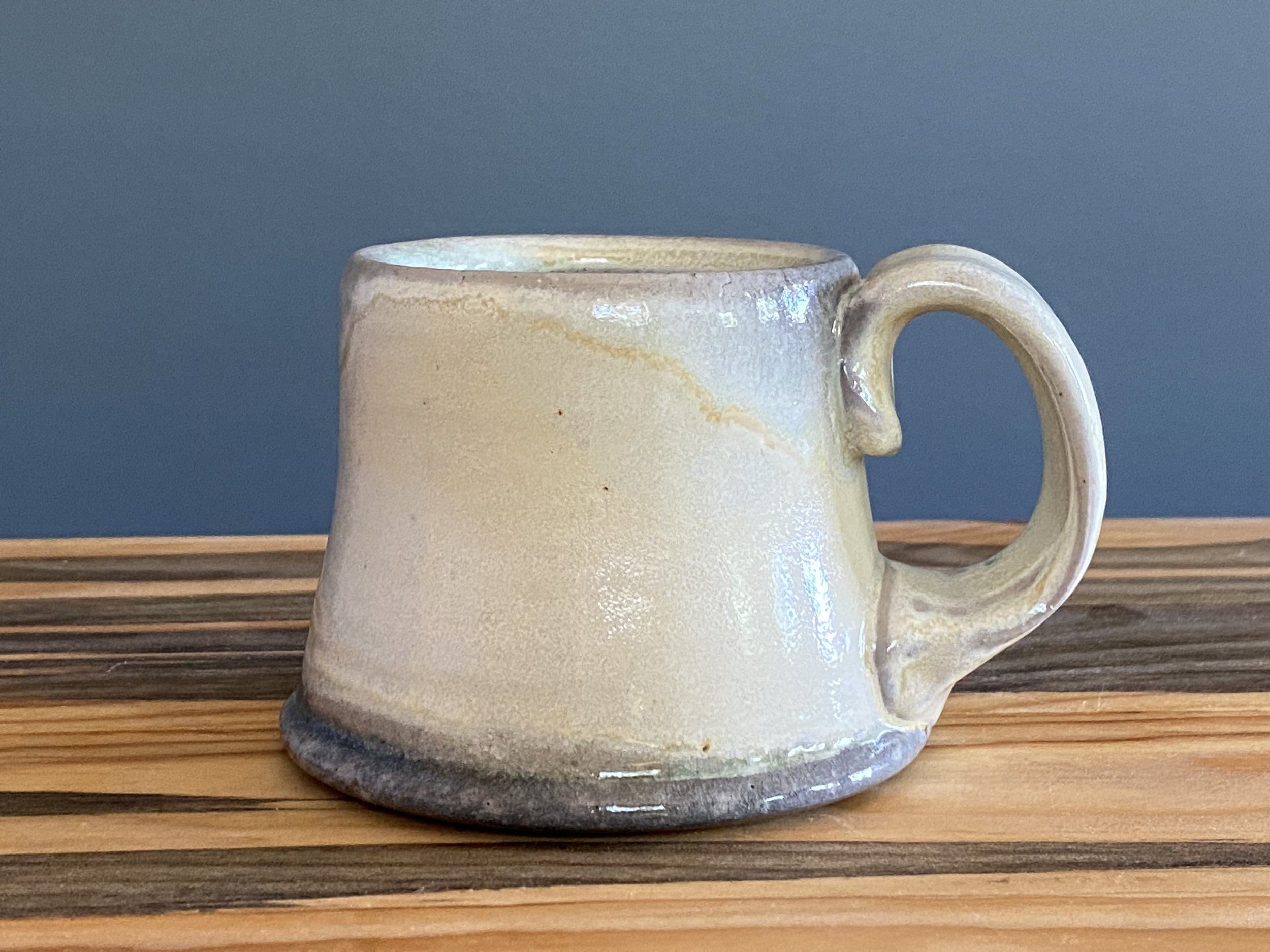 Stoneware mug with yellow salt glaze