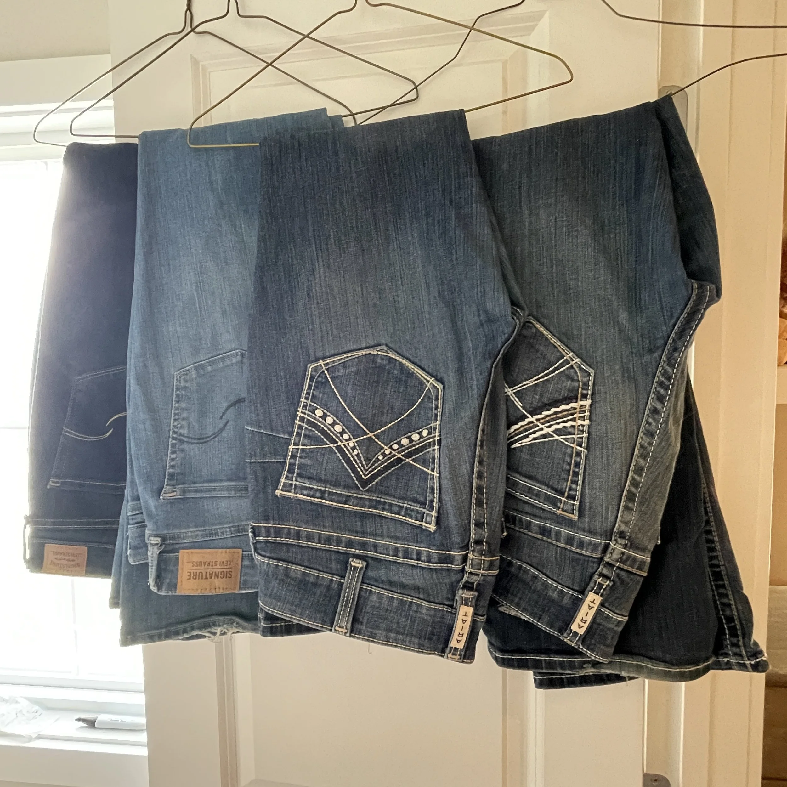 Levi’s and Ariat Cowgirl Jeans