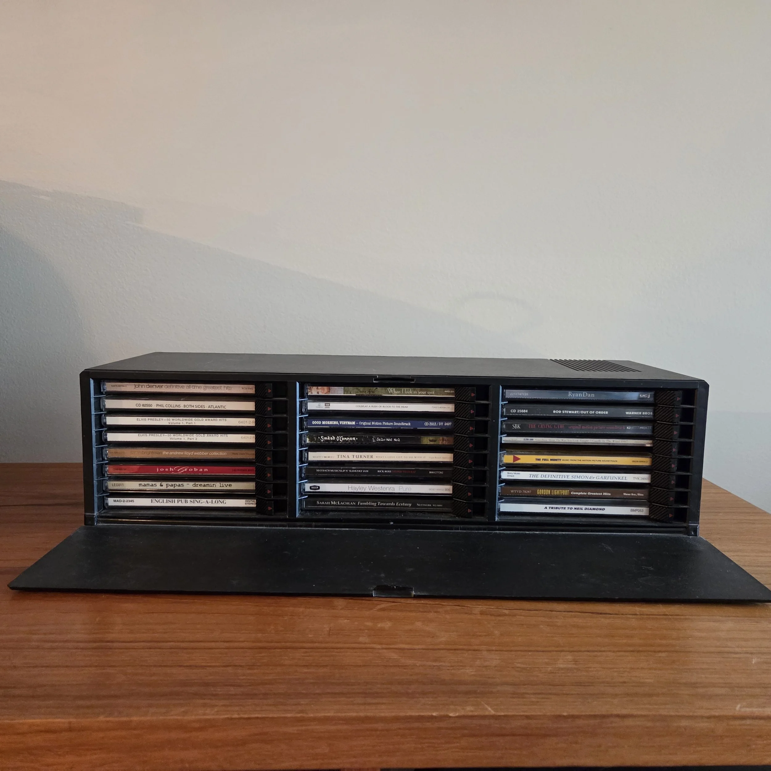 Assorted CDs w/ Plastic Stand
