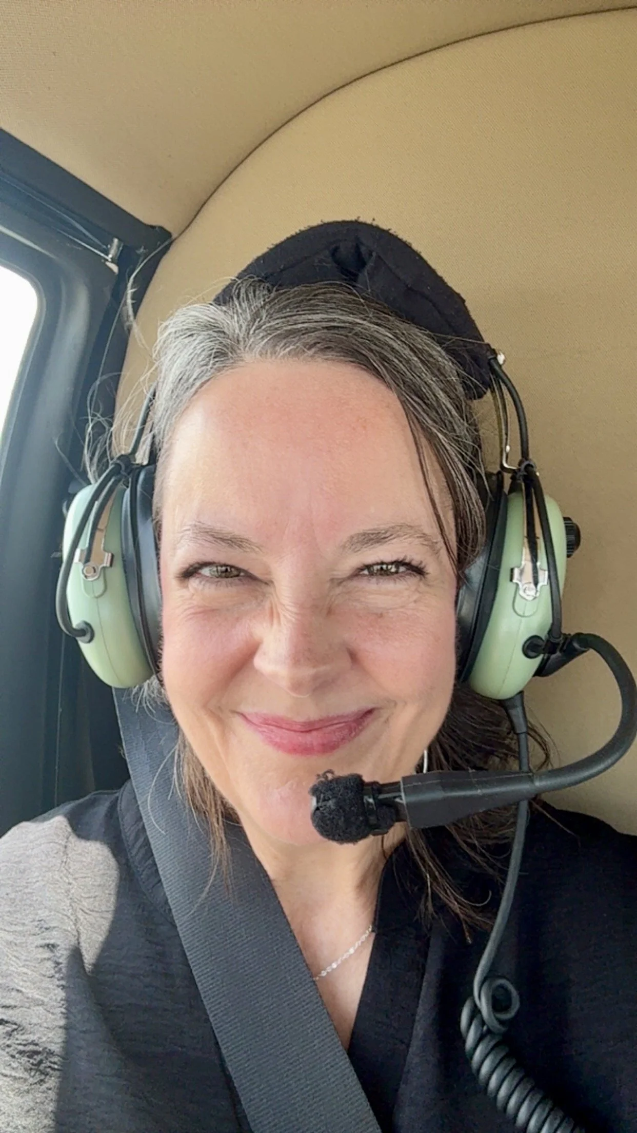 Scarlett Royce, copywriter, in a helicopter