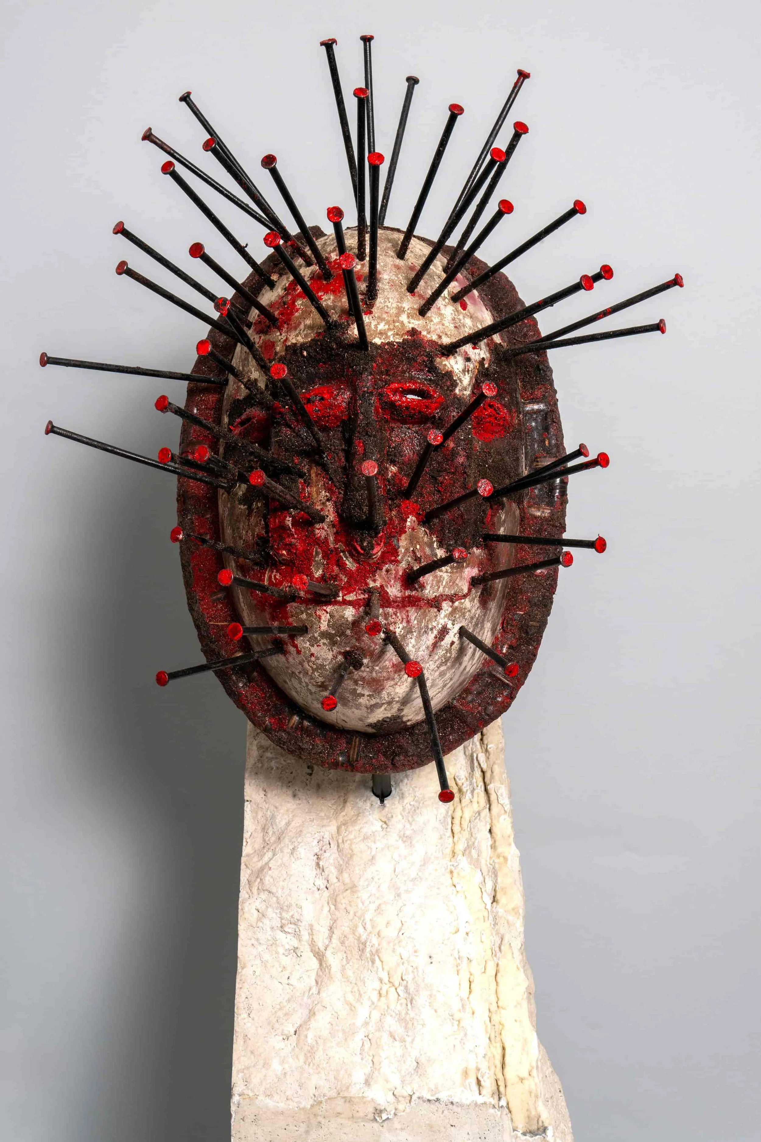   Sunshowers   14" x 15" x 39-1/2"High 130lbs  West African wood, Roman travertine, iron, earth, and acrylic pigment 