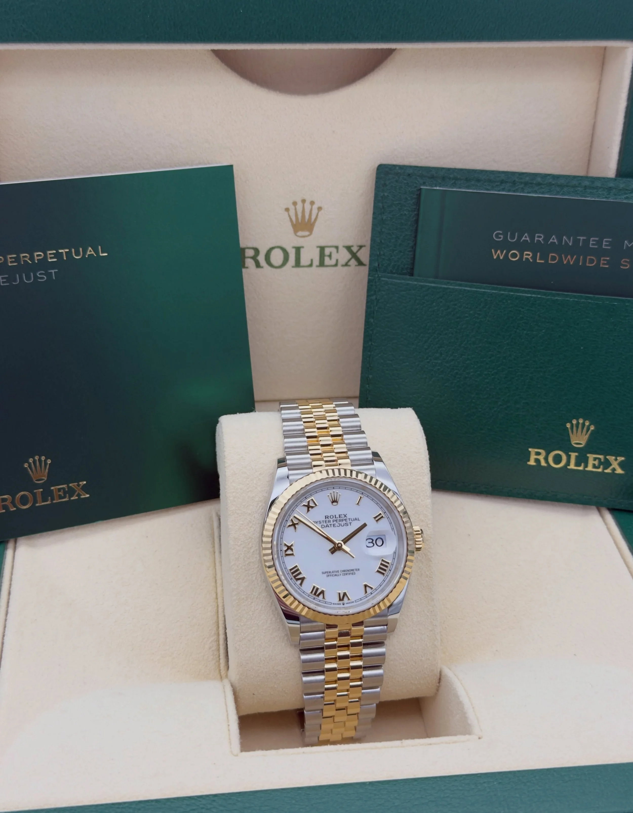 NEW IN!🔥Rolex Datejust 36mm in Stainless Steel &amp; 18ct. Yellow Gold featuring Fluted Bezel, White dial with gold roman numerals, Jubilee link bracelet. 

Model Reference: 126233.

Contents: Box &amp; Papers, Seal Tag.

Year: June, 2023.

Excellen