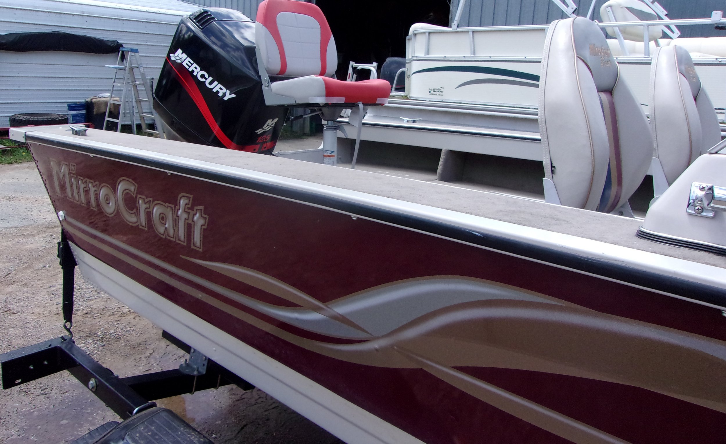 2002 MirroCraft 125 Mercuy 5.JPG