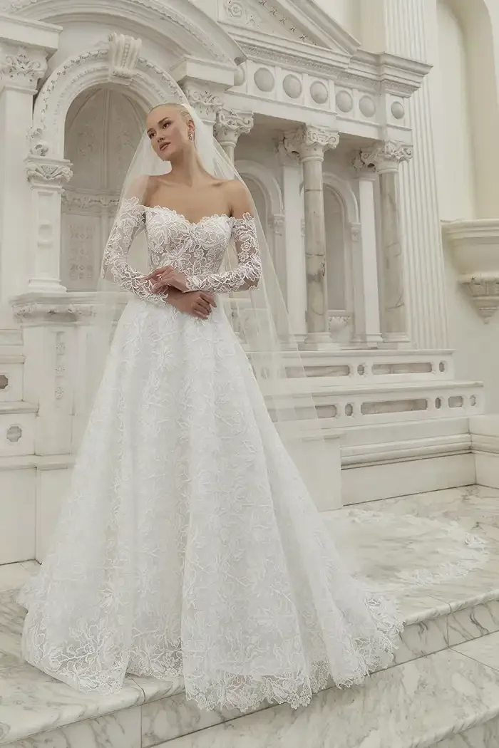 savvi-bridal-a-line-sweetheart-floral-organza-long-sleeve-cathedral-veil-wedding-dress-raleigh.webp