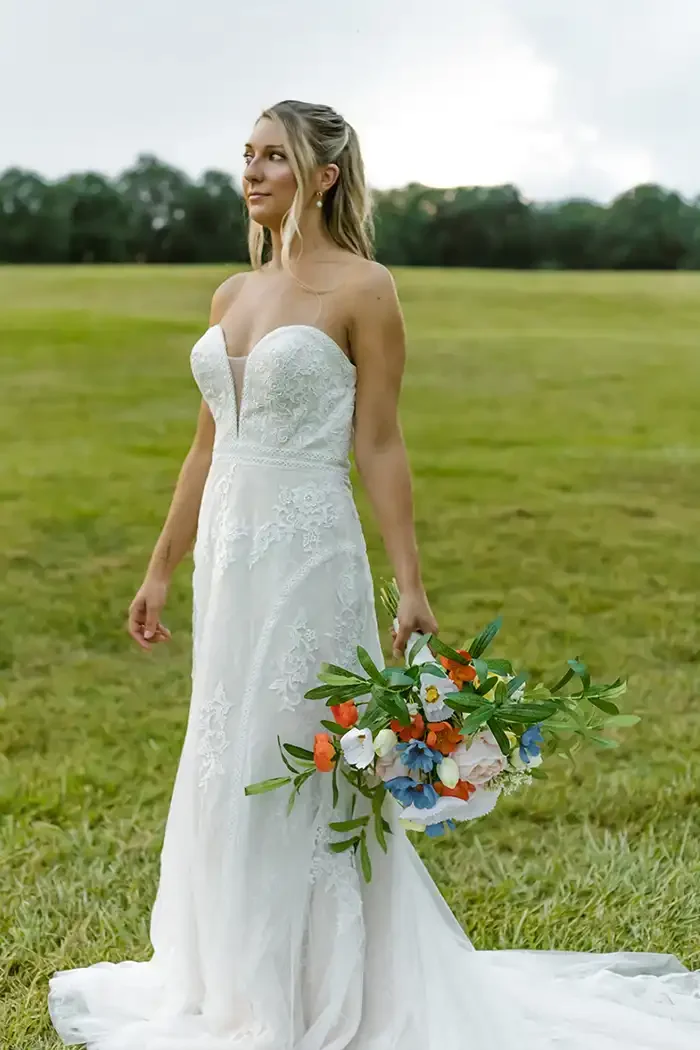 savvi-bridal-lace-a-line-deep-v-on-model-wedding-dress.webp