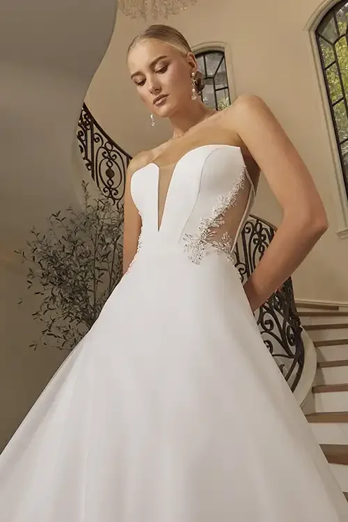 A beautiful satin organza ball gown available at Savvi Bridal Raleigh NC.webp