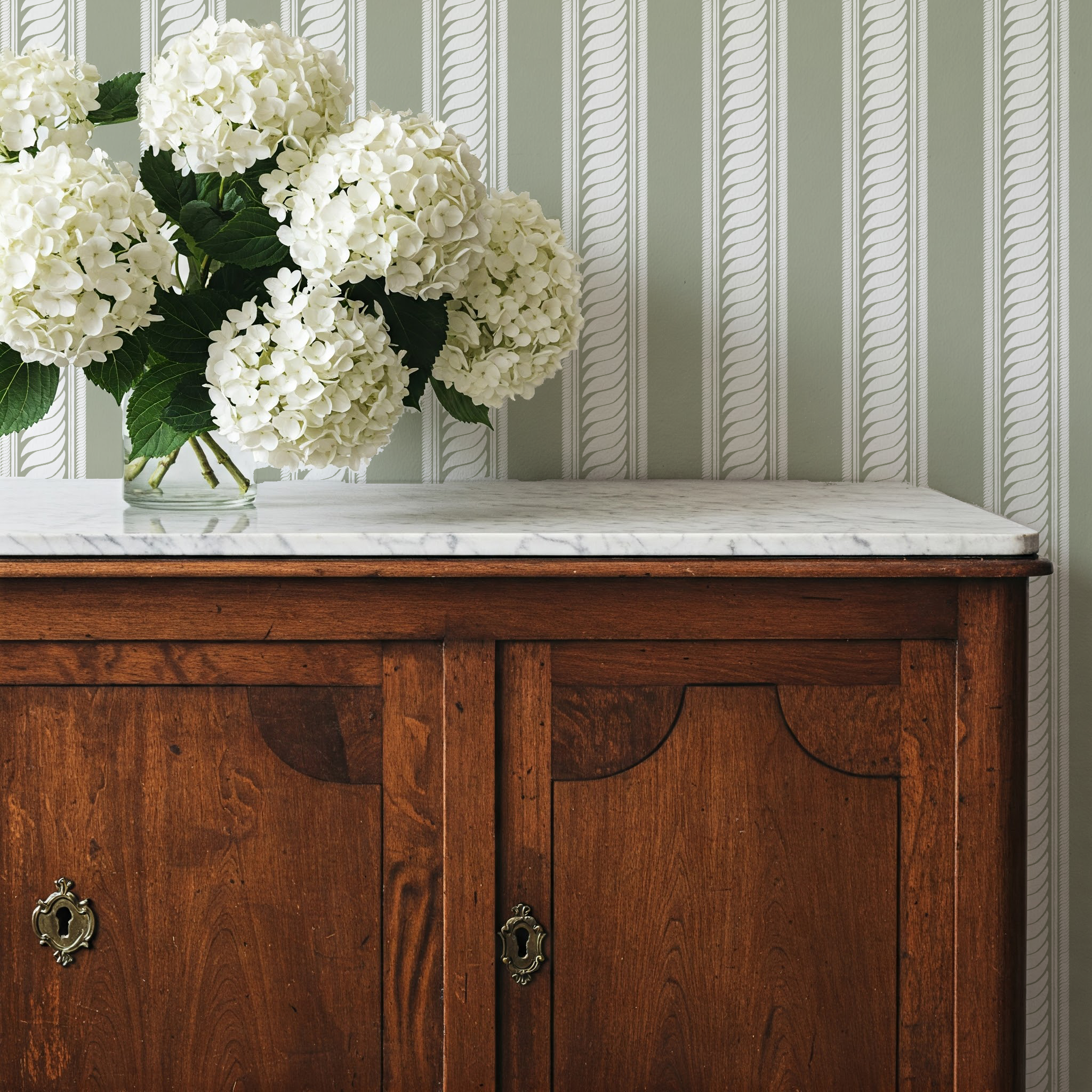 maison stripe sage reverse_antique credenza with flowers mockup.png