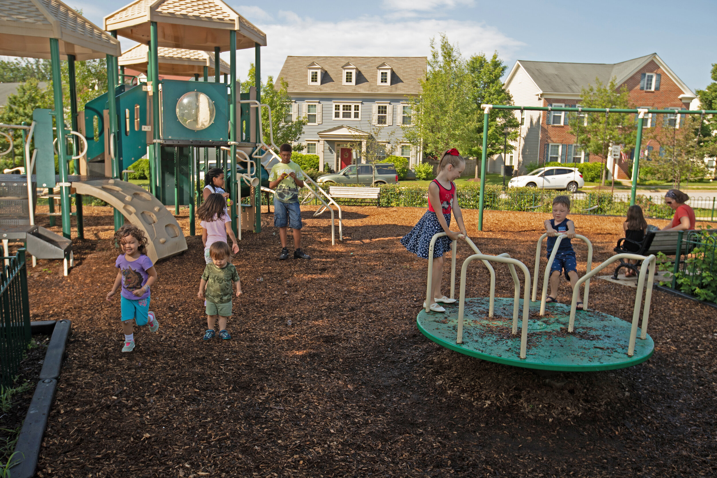 Children enjoying the community jungle gym at The Villages at Belvoir.  