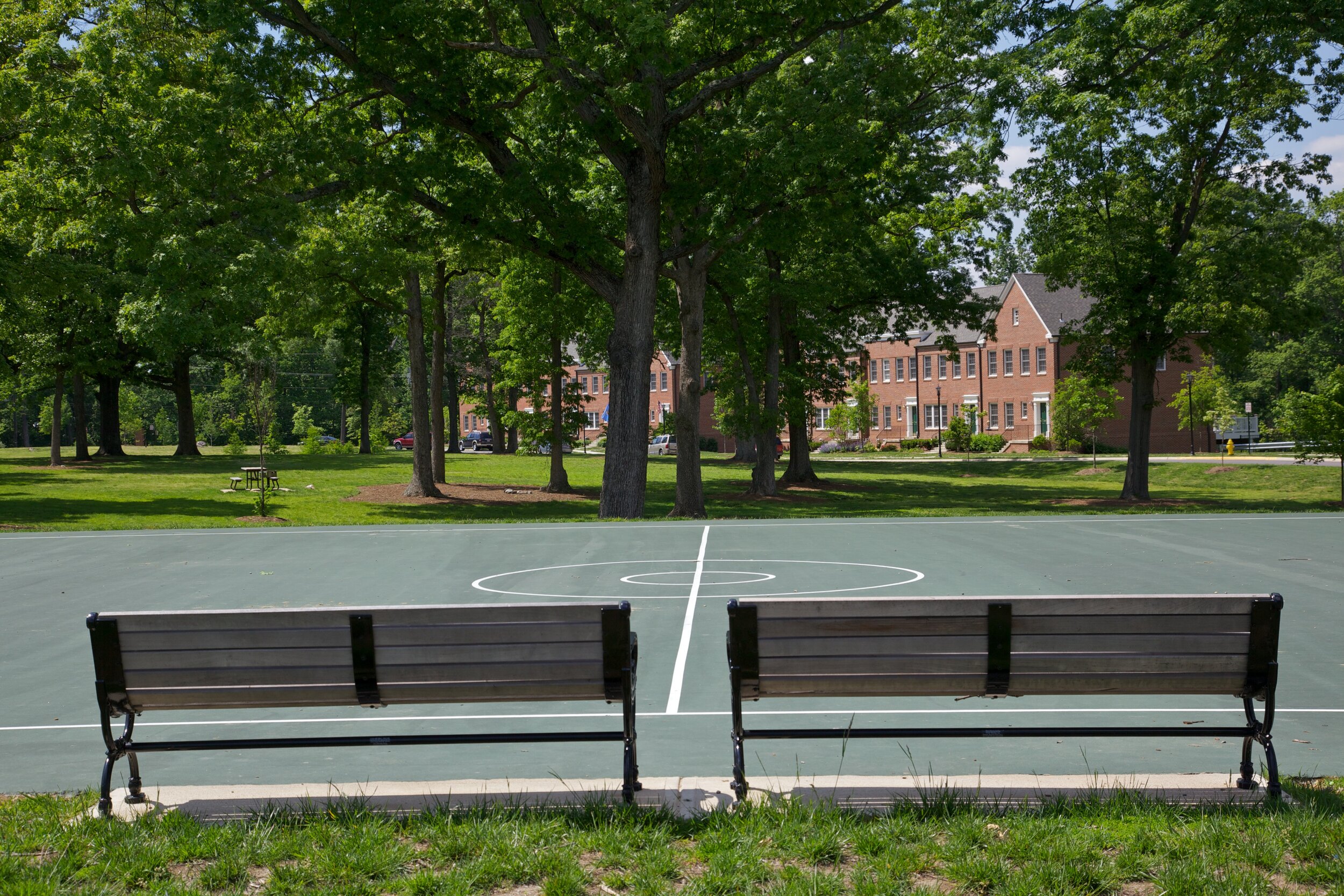 Residents enjoy playing pick-up games at the community basketball court.