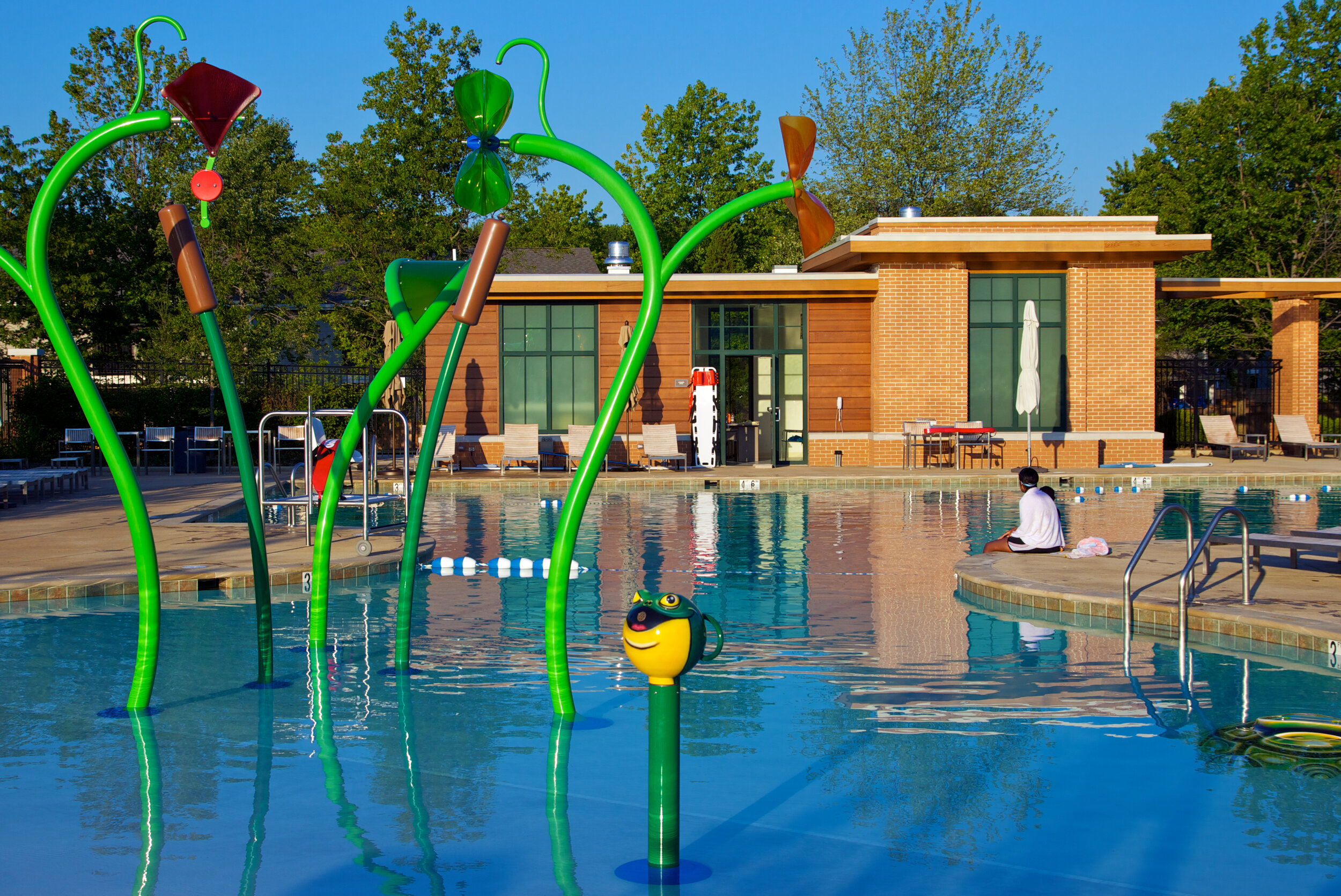Community amenities include a resort-style pool and splash-pad.