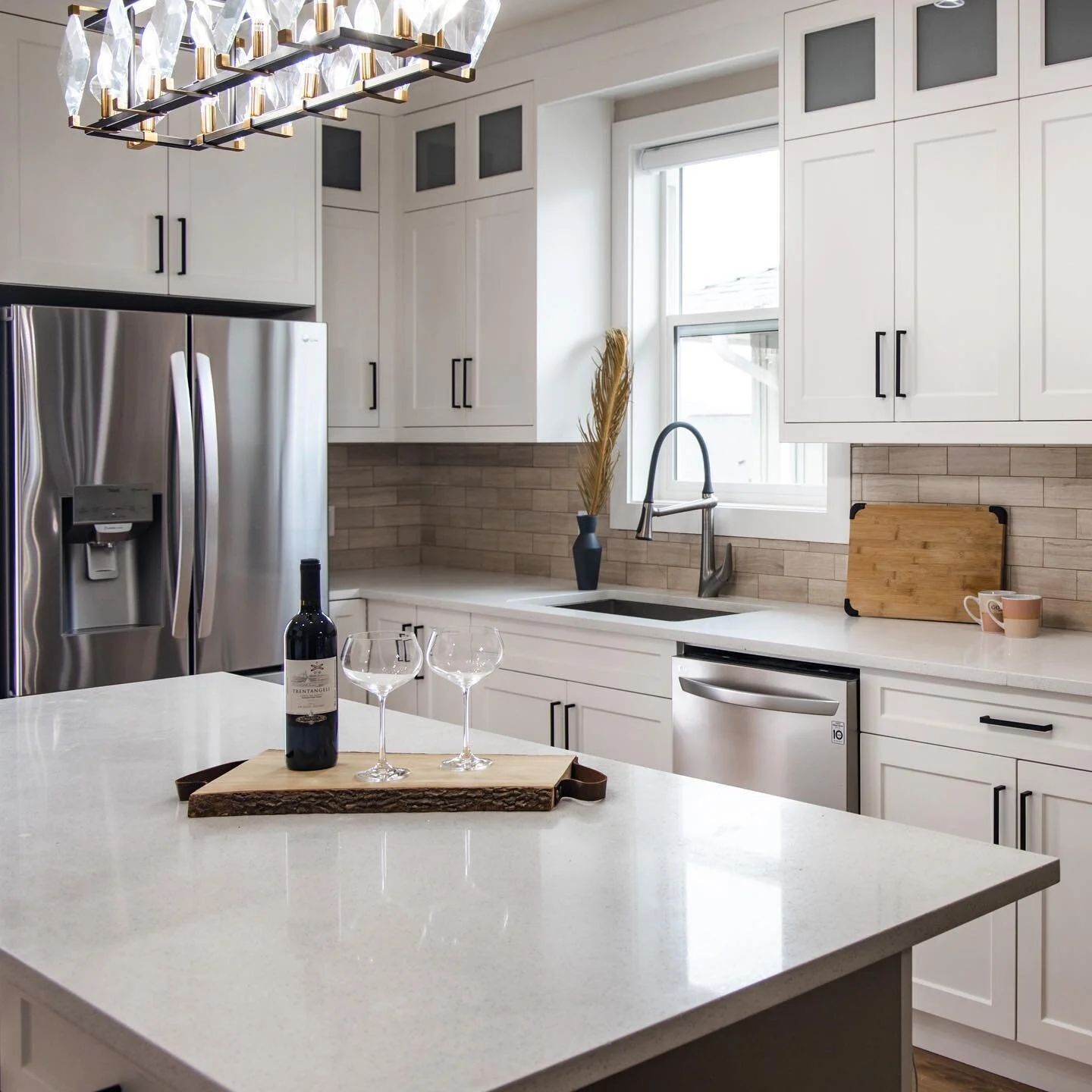 We loved working with our clients designing their kitchen - making their dream of a beautiful white kitchen reality...

At Binning &amp; Sons Development our mission is to build exceptional new and custom homes designed with every detail in mind.

Co