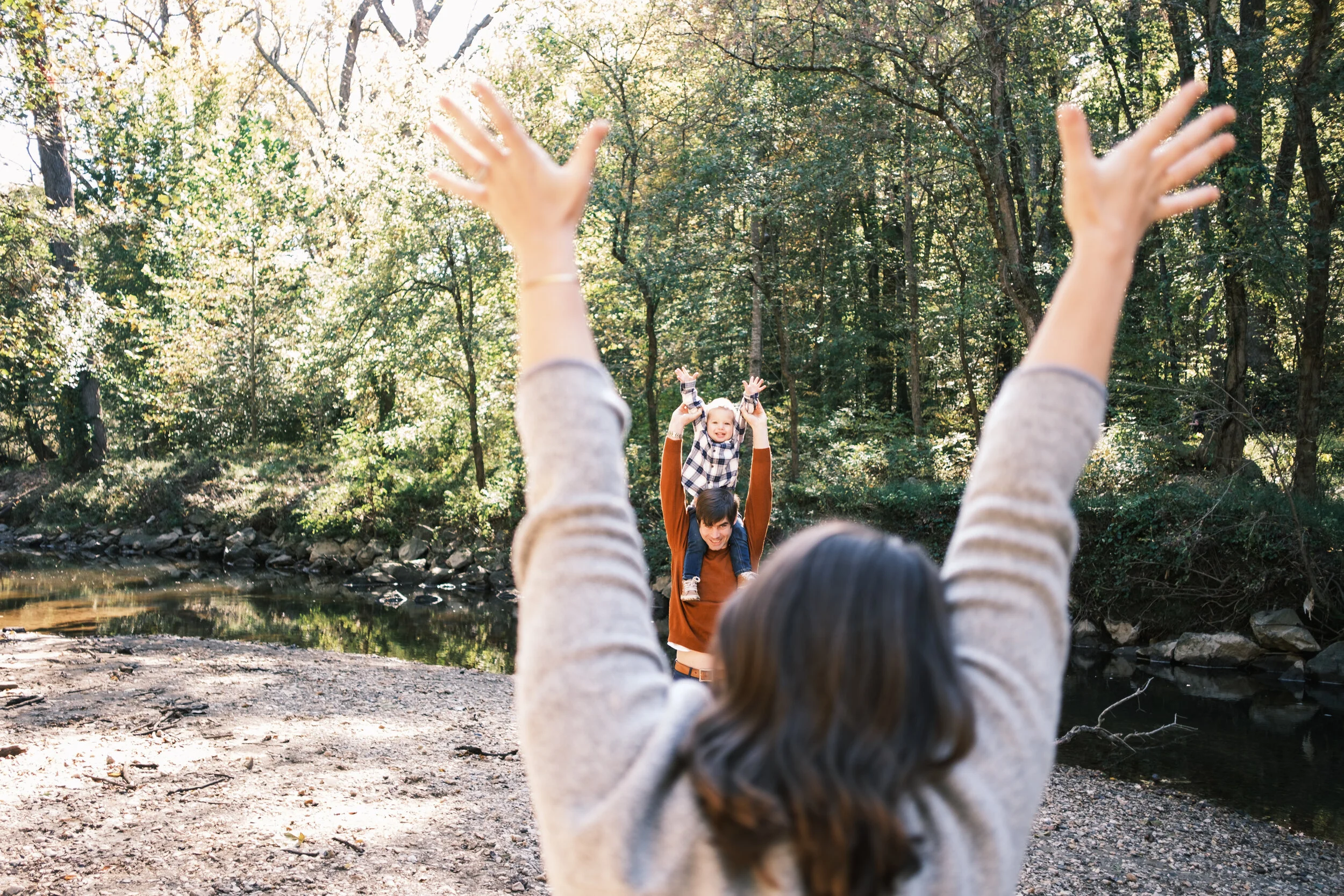 family of three having fun during family photo session in Charlotte by Brandon Pickett Photography