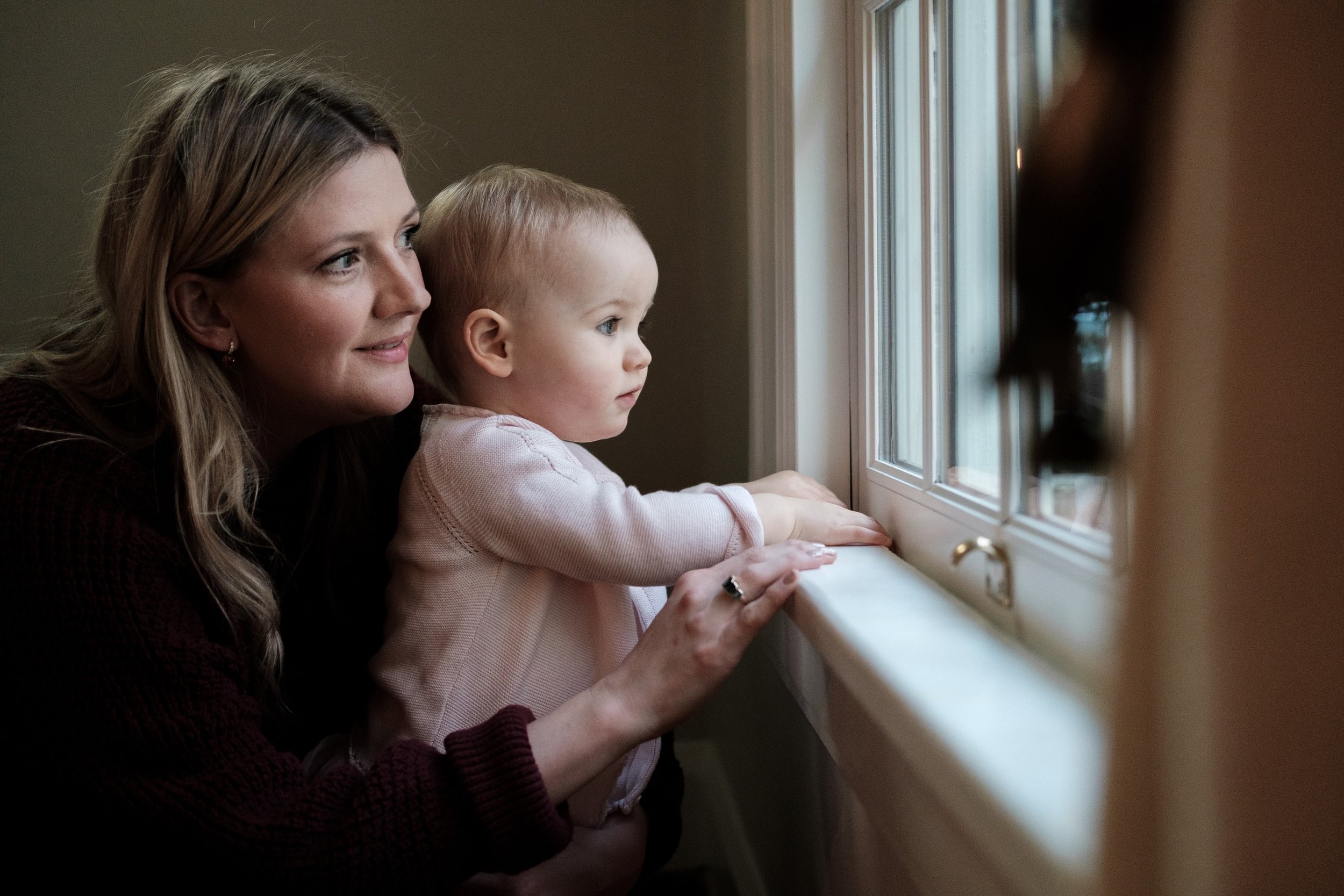 mother and her toddler daughter by Charlotte family photographer Brandon Pickett