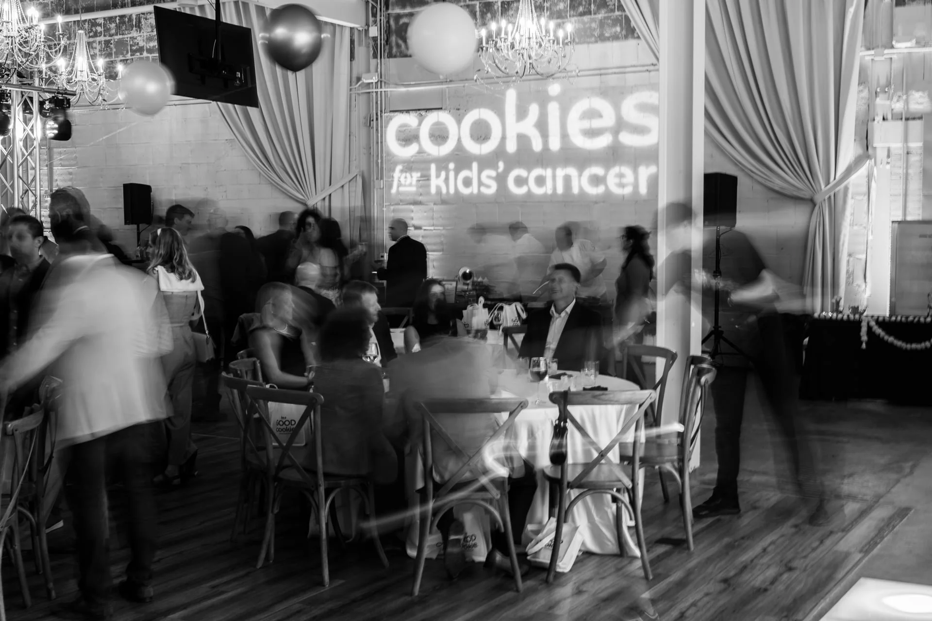 black and white blurry photo using slow shutter speed at Charity event in Charlotte.