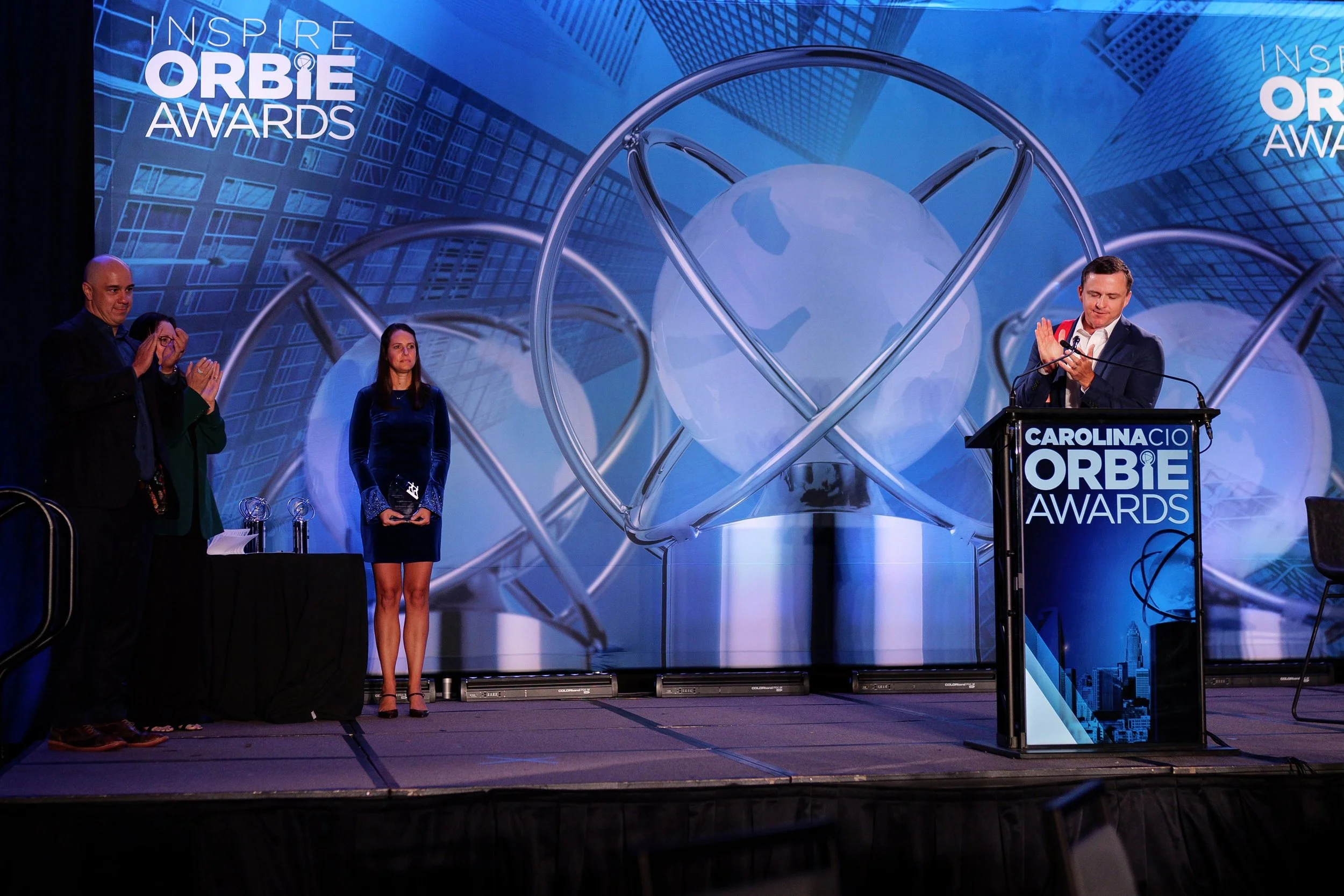 man clapping after receiving award at The Orbie Awards in Charlotte, NC by Brandon Pickett Photography