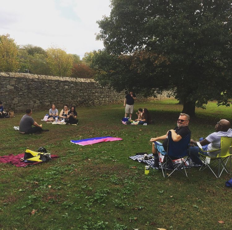  Though most of our events were virtual, we found ways to make a handful of socially distant outdoor events work, with a limit on attendance and by keeping our picnic blankets far, far apart.  &nbsp;     A photograph showing a grassy area in a park, 