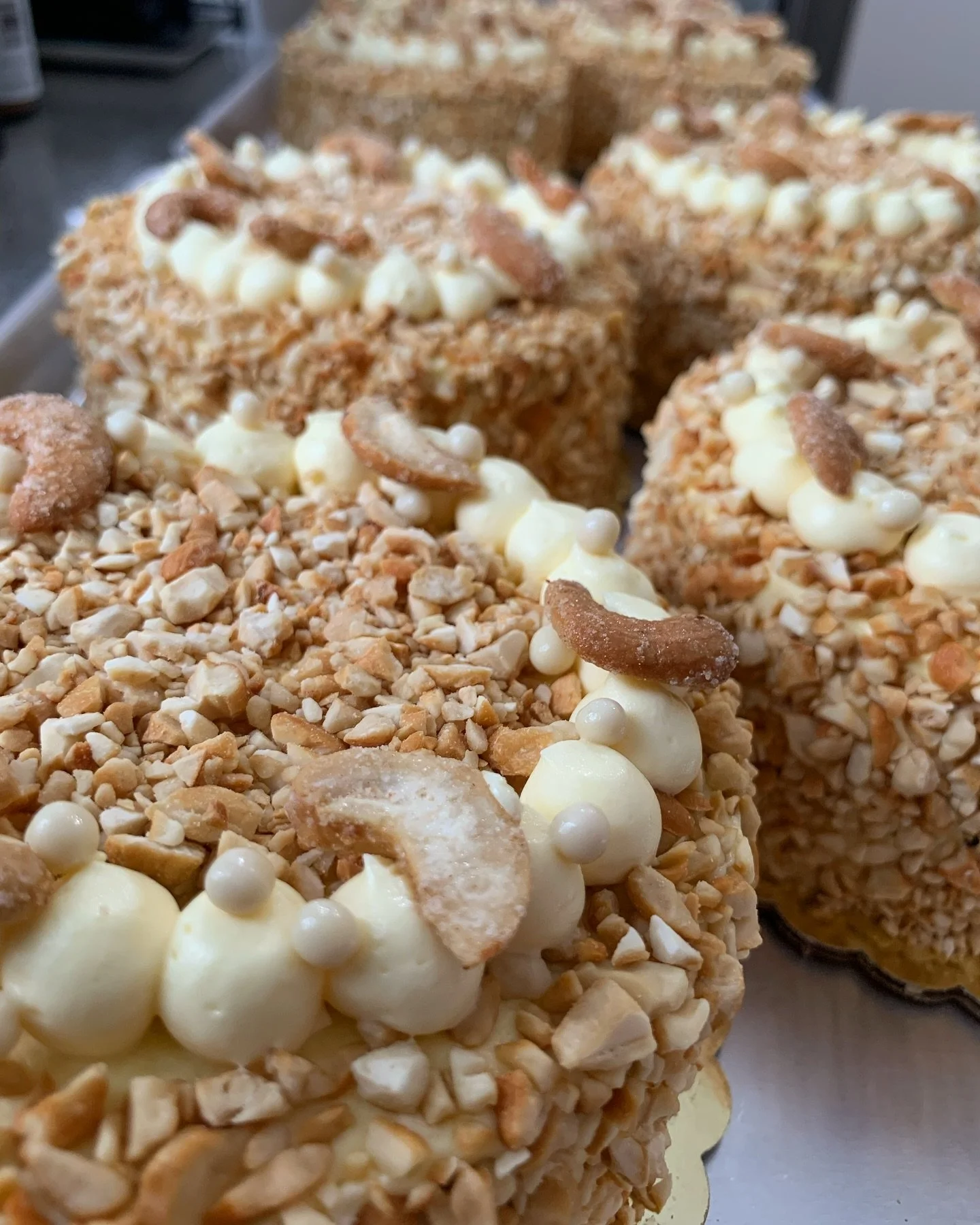 Sans Rival- which translates to No Rival is a beloved Filipino cake made of layers of Cashew Dacquoise (nut meringue), French Buttercream and Roasted Cashews

This product has always been a best seller on our holiday menus. And Is now available to or