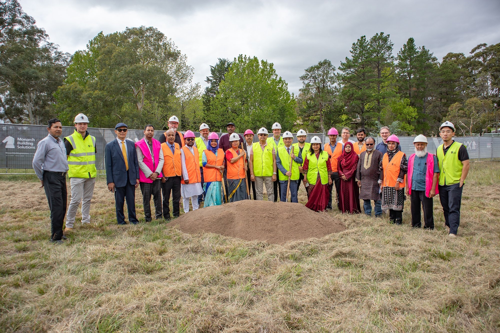  The High Commissioner, H.E. F. M. Borhan Uddin, and Minister Mr. Kiriti Chakma led the celebration, marking the milestone by turning the first sod and blessing the grounds prior to construction commencing. 