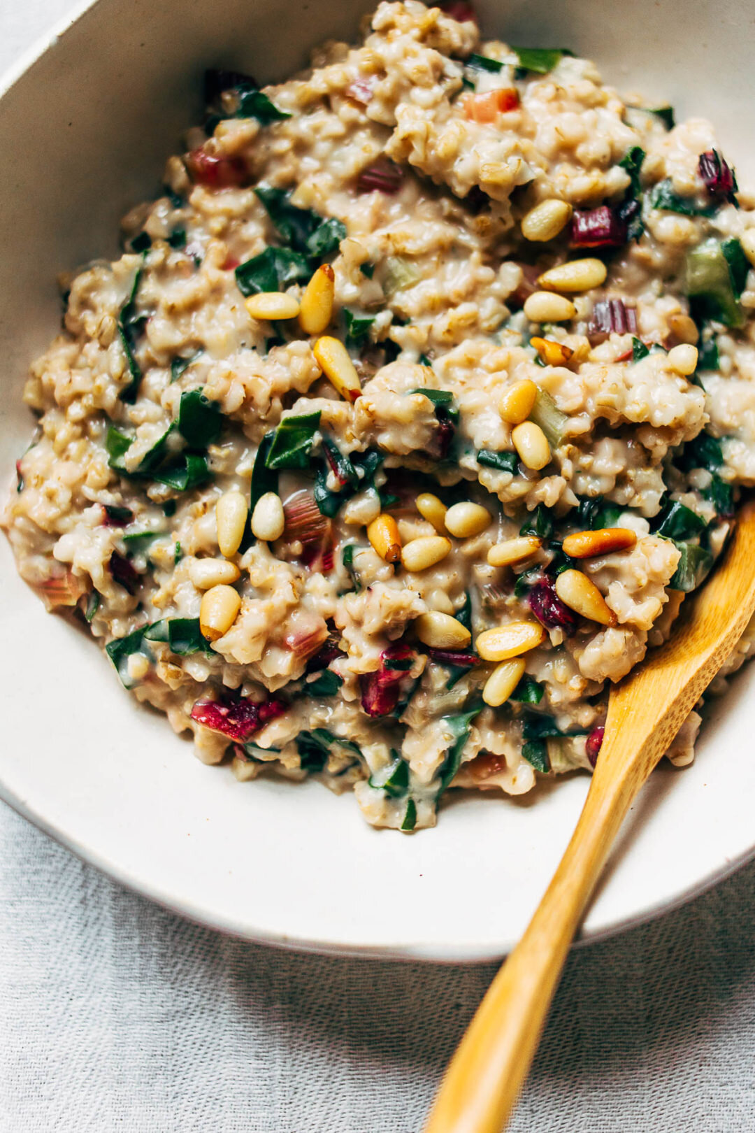 Creamy Steel Cut Oats with Chard and Pine Nuts