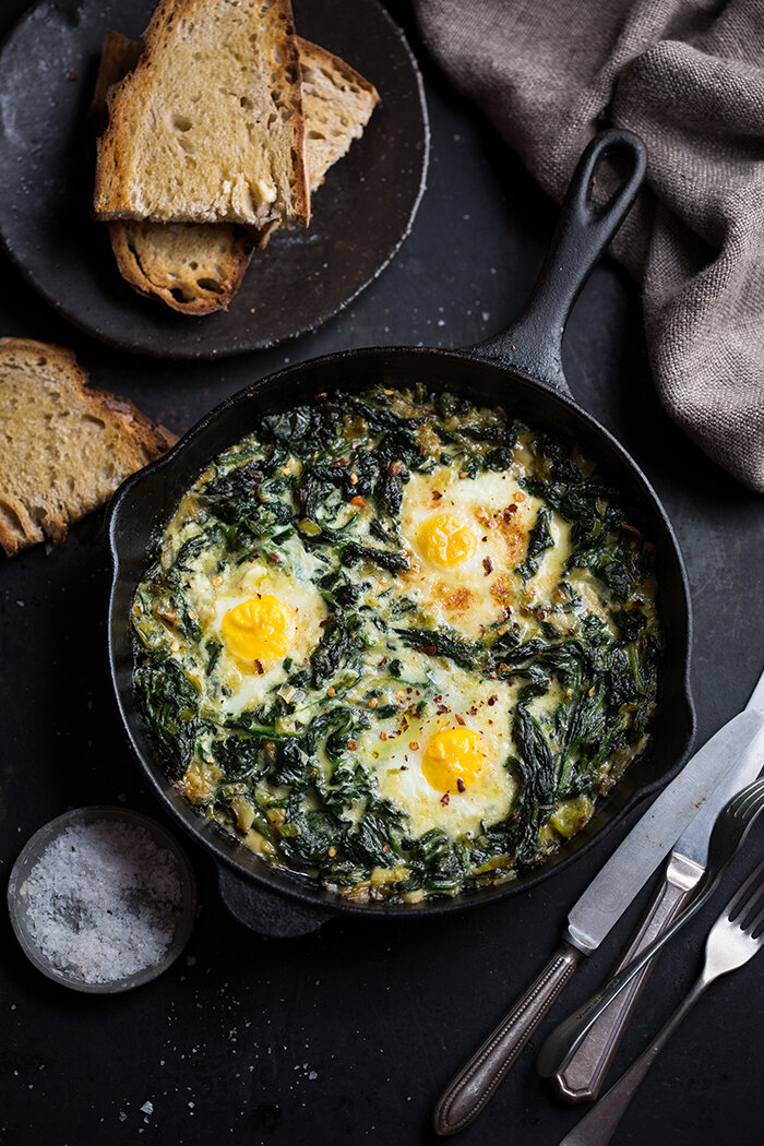 Eggs baked in creamy spinach &amp; leeks