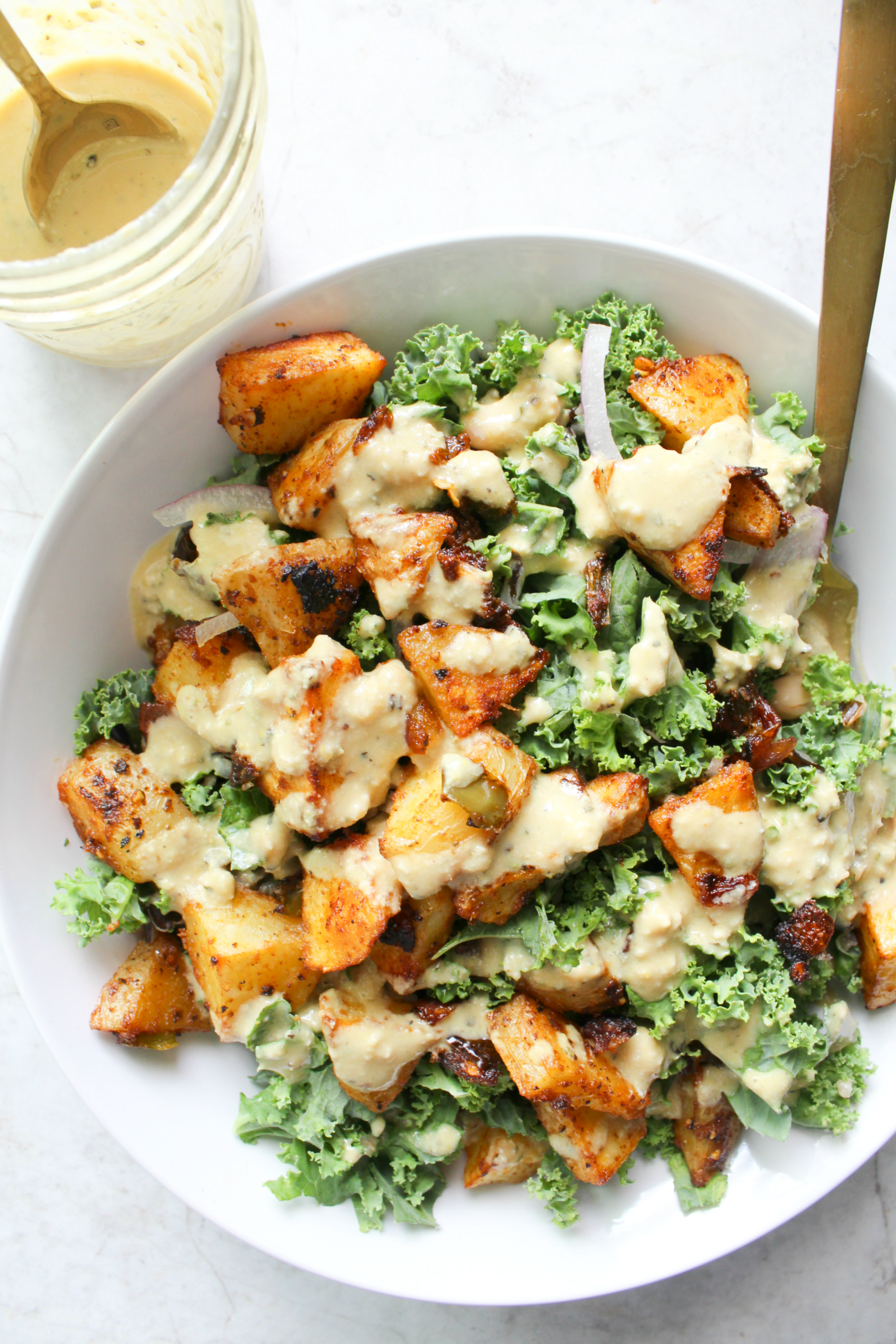 Spicy Potato Kale Bowls with Mustard Tahini Dressing