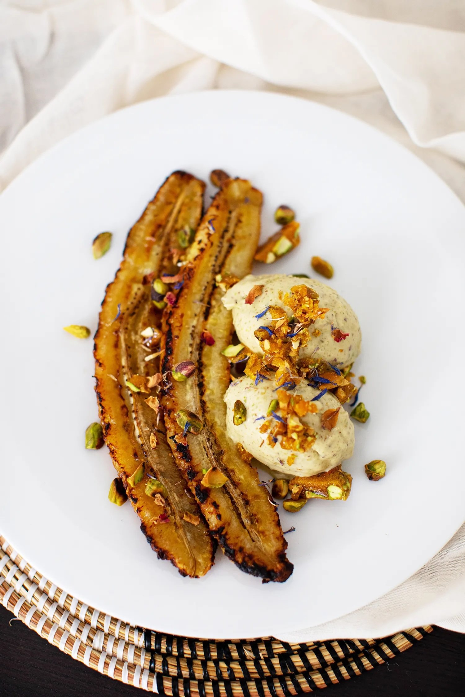 Roasted plantain with pistachio ice cream &amp; salted pistachio brittle