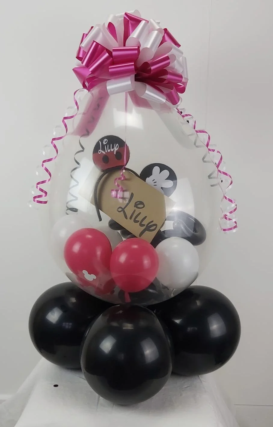 We're going to Disney Ticket in Balloon 
£22 + cost of toy