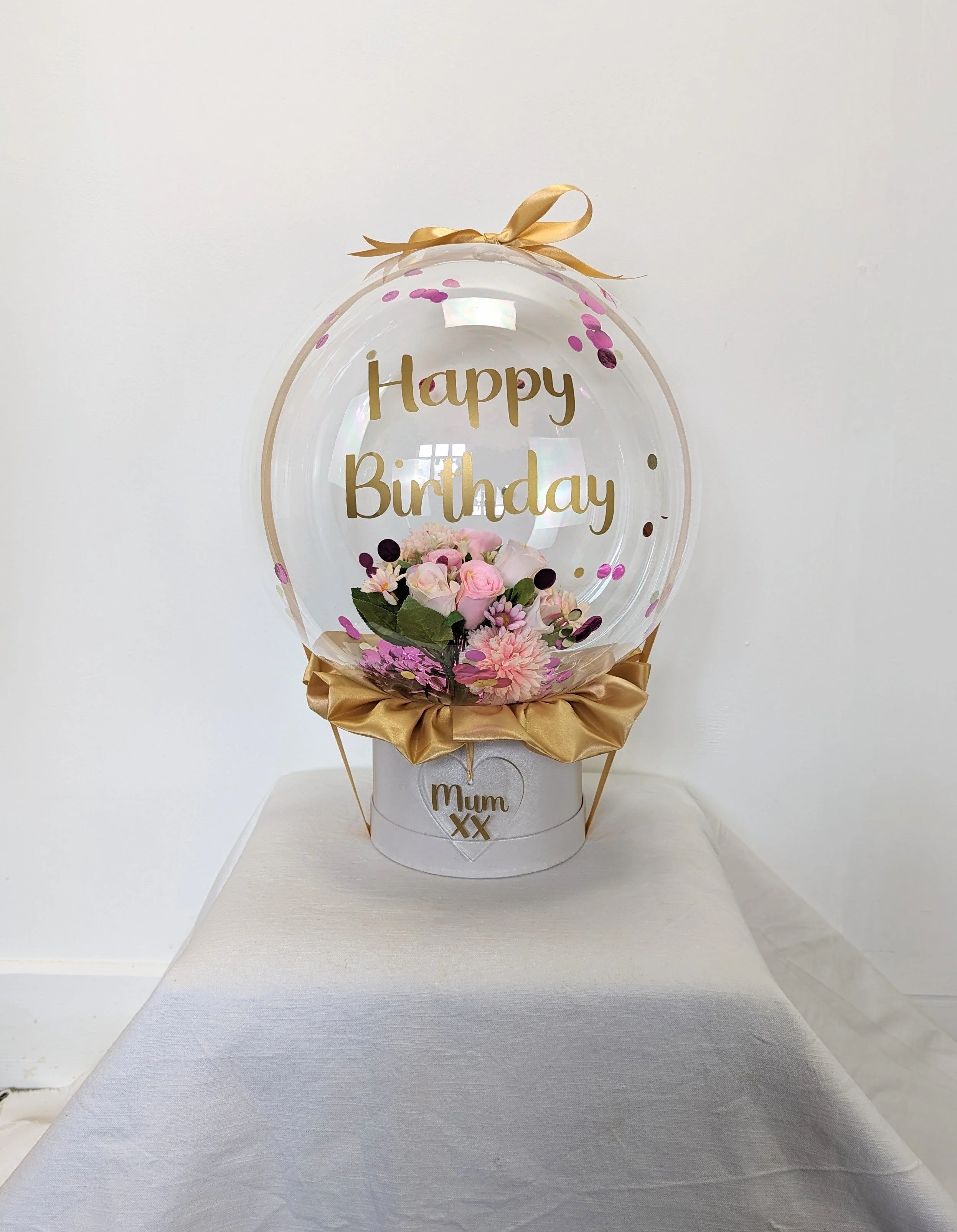 Flower display in clearz balloon with satin trim & personalised £30