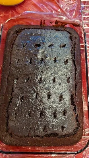 baked cake with holes poked