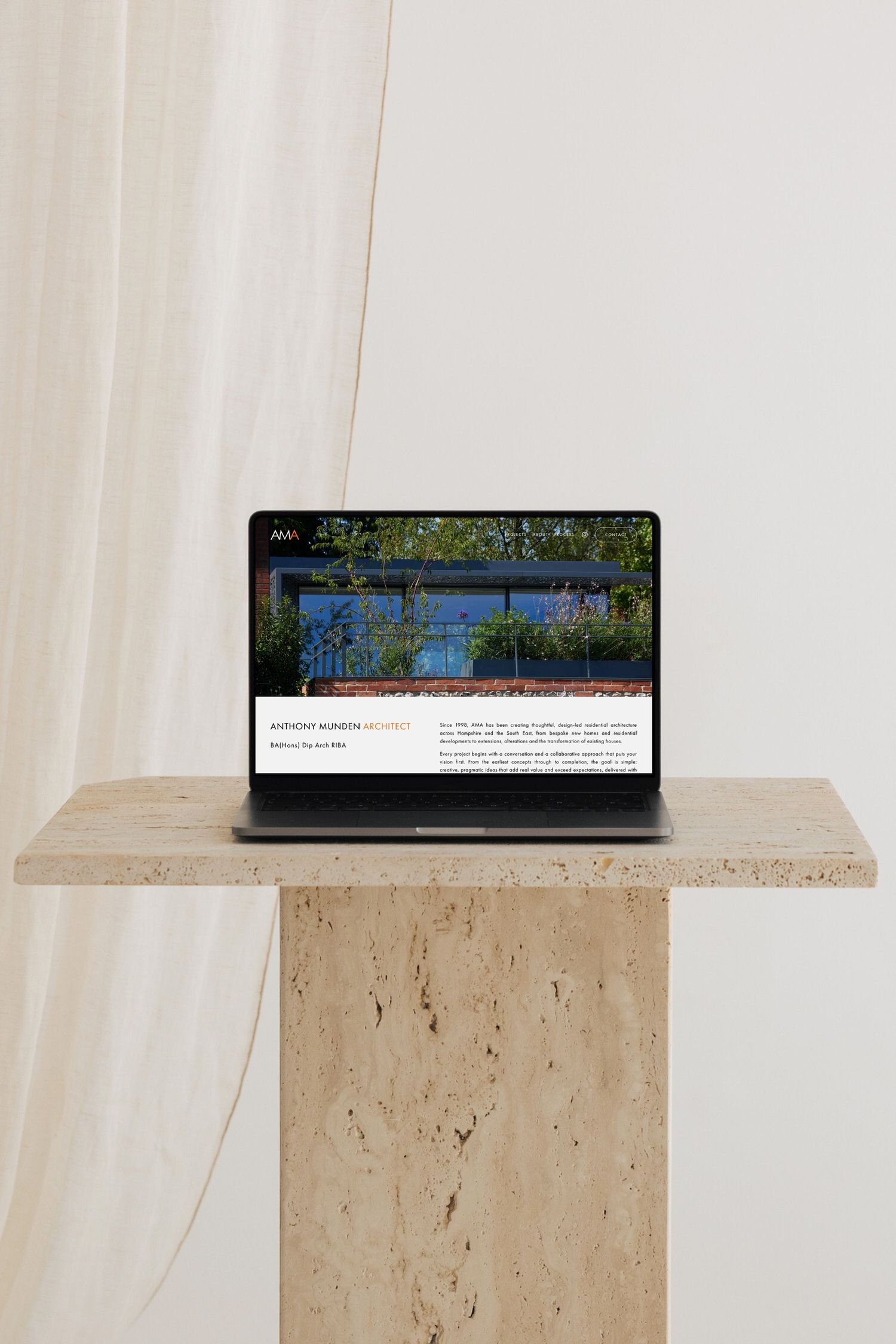 AM Architect  MacBook Mockup-1.jpg