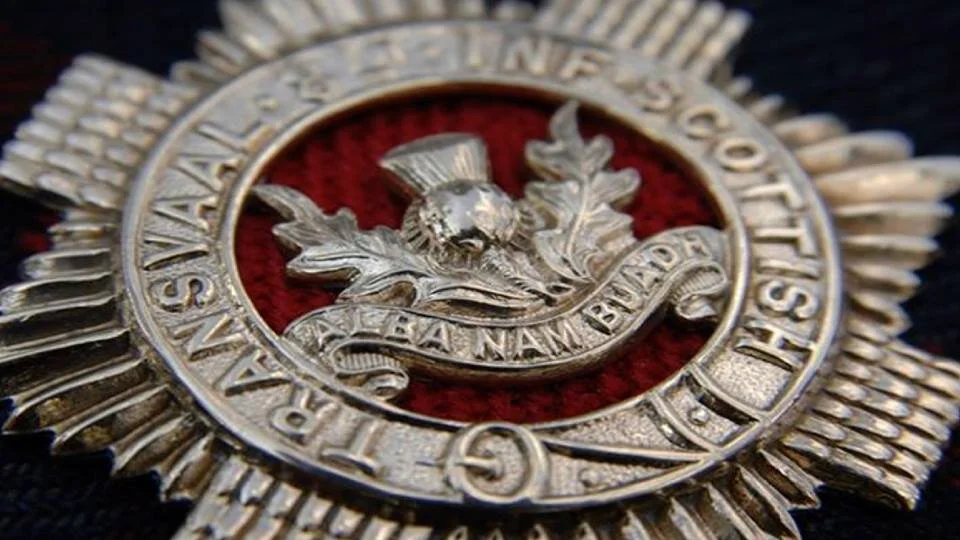 badge silver.jpg