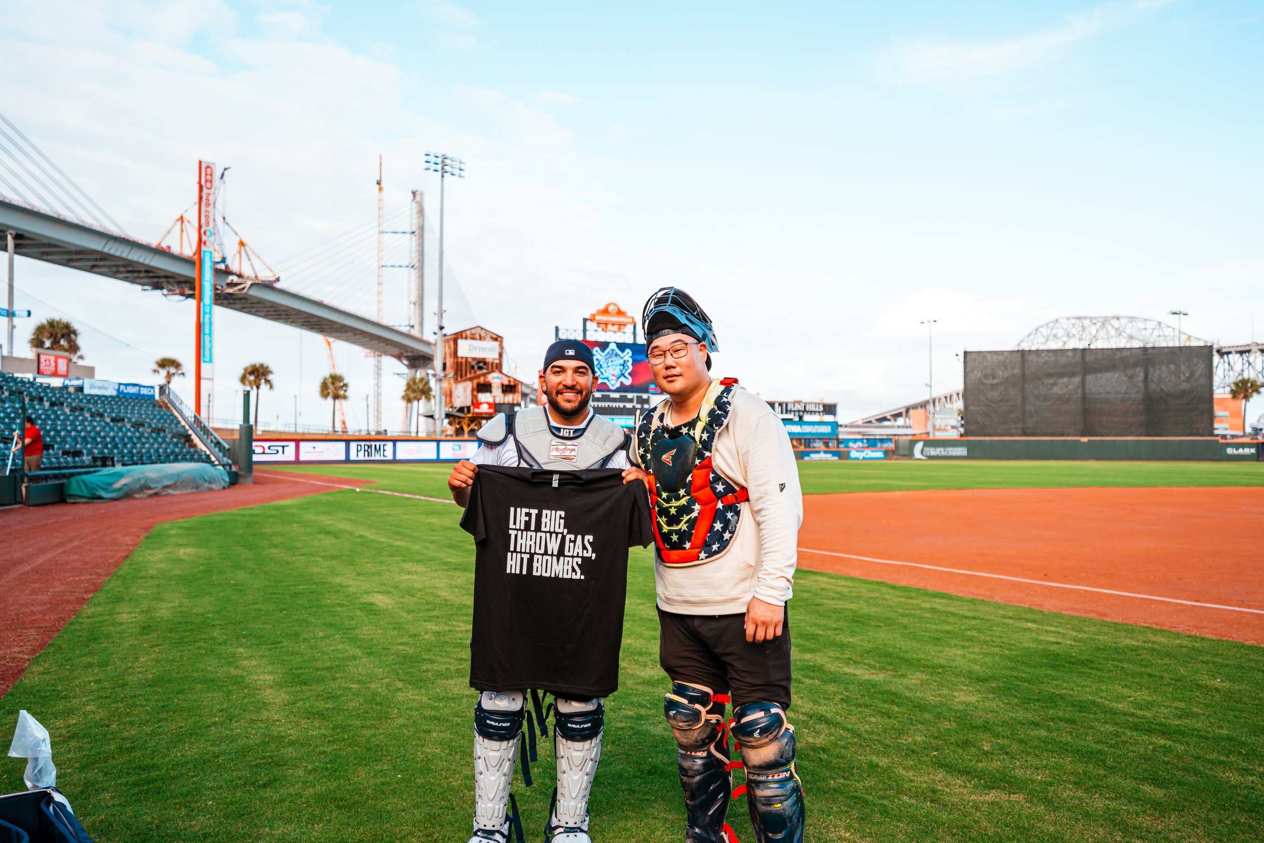 Jose Trevino poses with Eric Sims, the 'King of JUCO' on YouTube, and close friend of Trevor Bauer, at Whataburger Field in Corpus Christi, Texas. Photo and Video by Sarate Baseball Media.