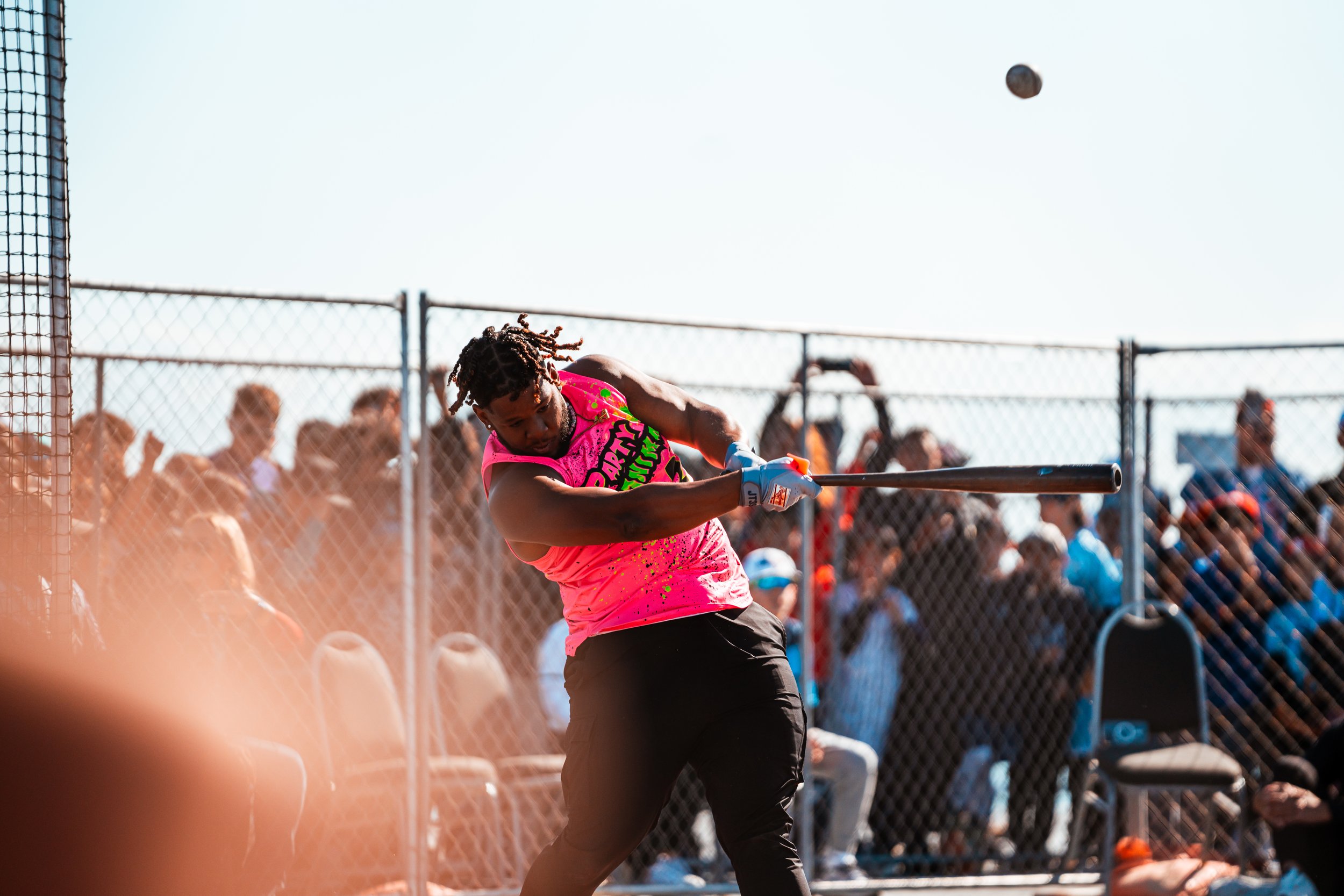 A player from the Party Animals, rival of Savannah Bananas, hits off of the USS Lexington in Corpus Christi, Texas. Photo by Sarate Baseball Media.